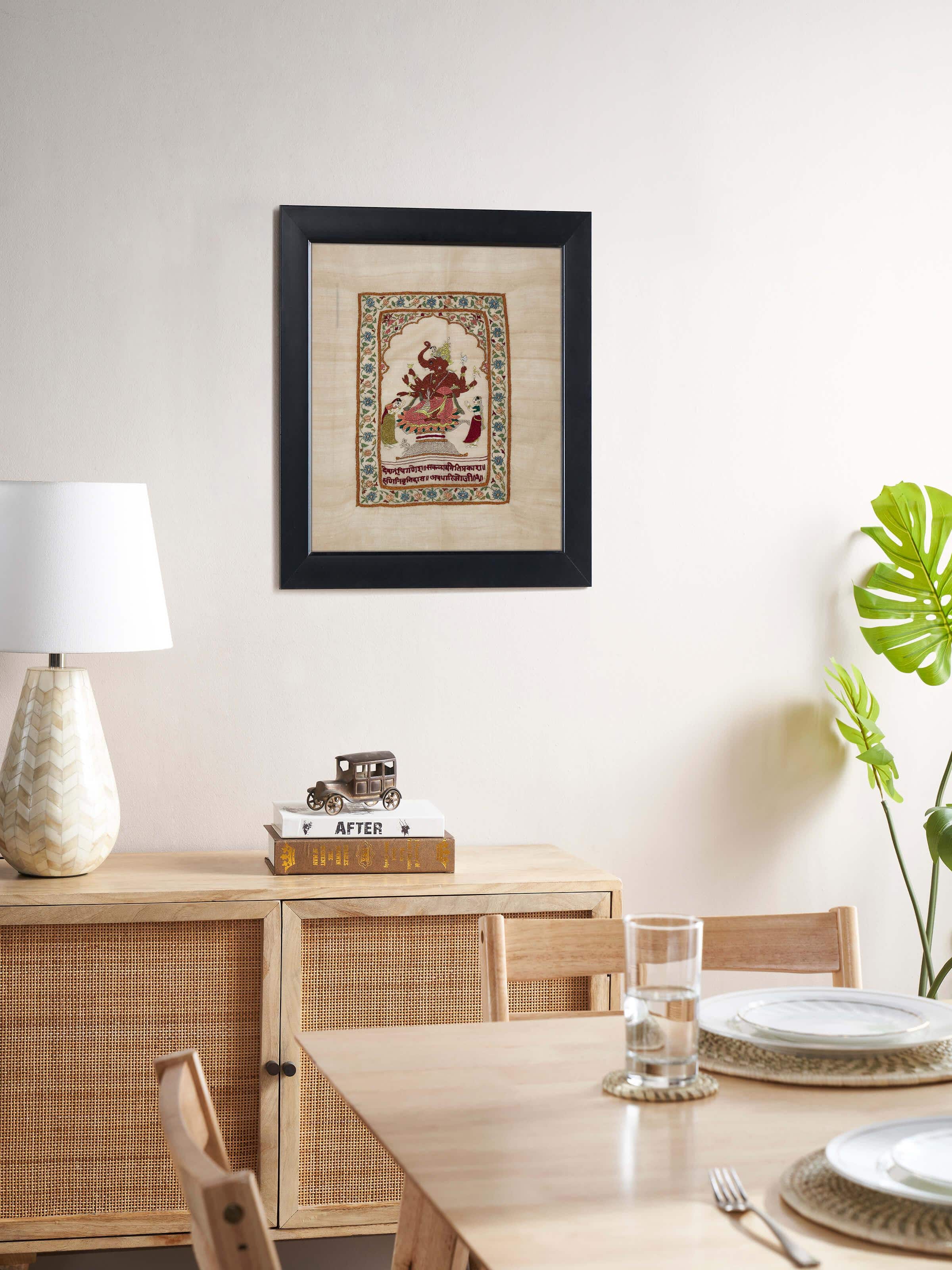 Side view of Chamba Rumal Ekdanta wall art highlighting the intricate stitching and fine detailing in the artwork.