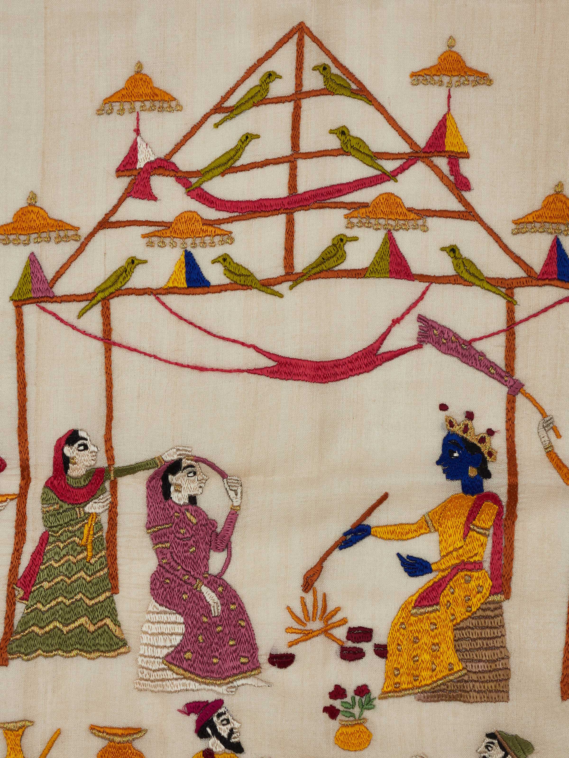 Close-up view of Chamba rumal vidhi wall art emphasizing the fine details and vibrant stitching.