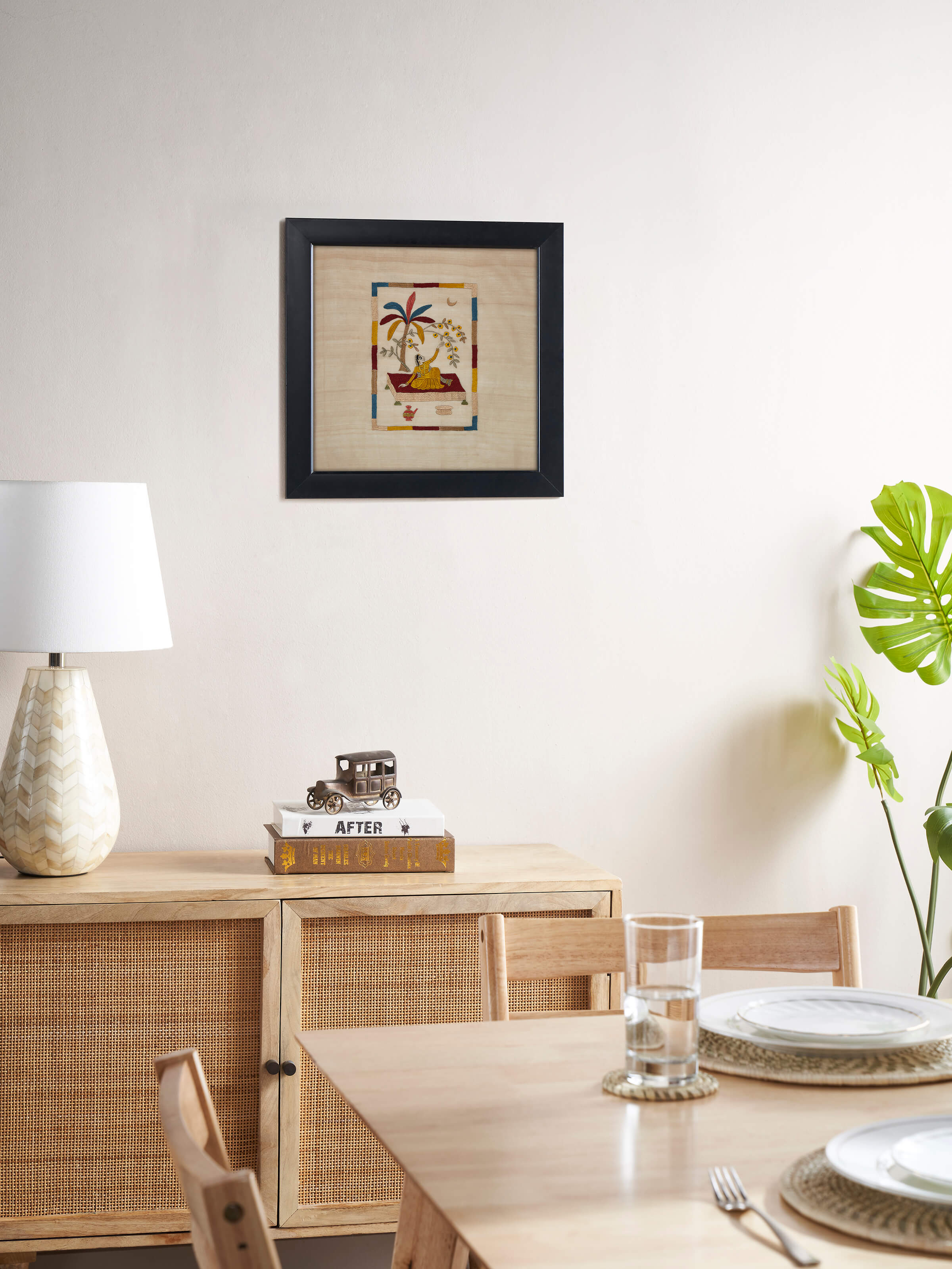 Side view of Chamba Rumal Nayika wall art highlighting intricate needlework and colors