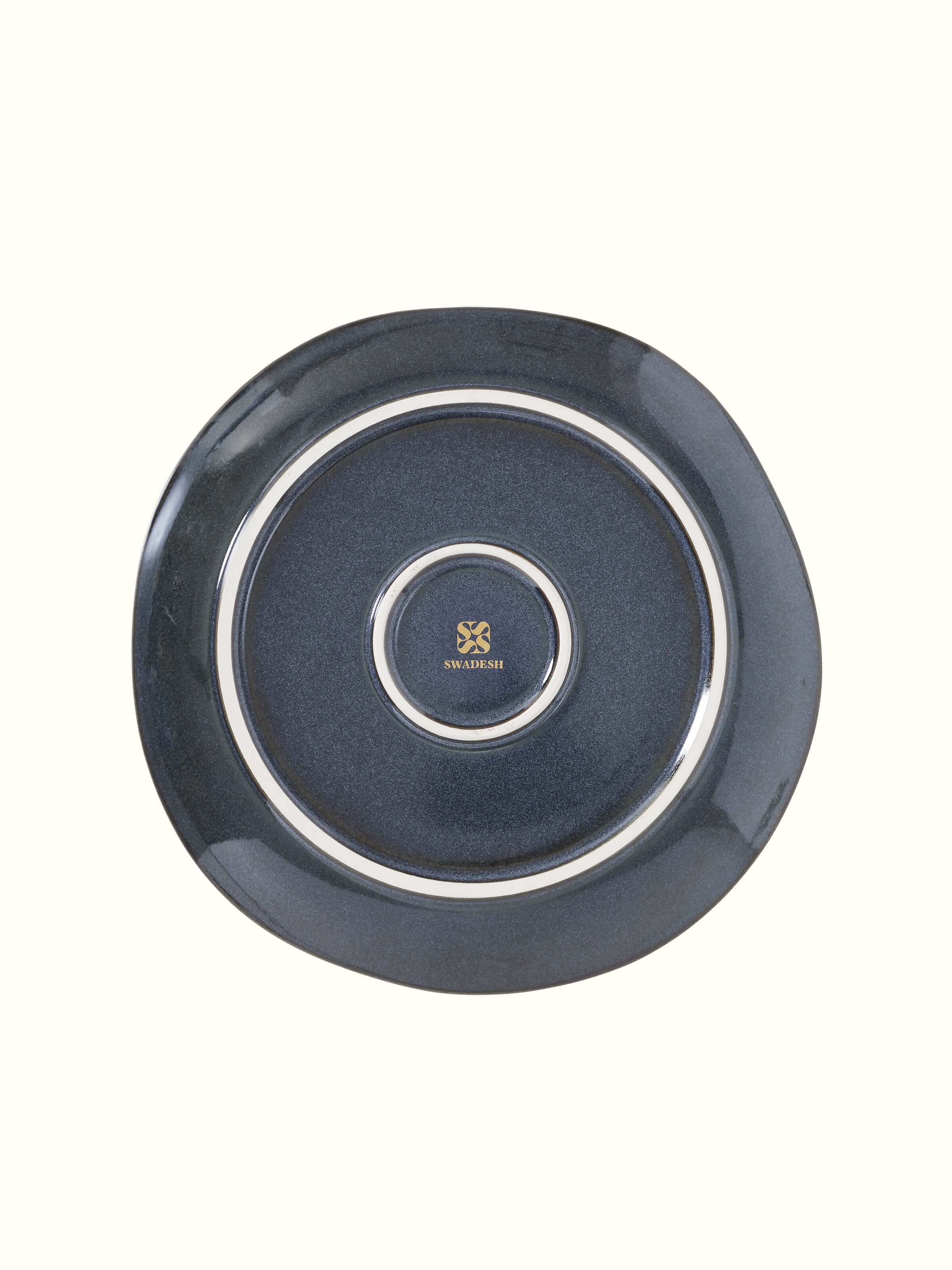 Angled view of Khurja pottery ceramic dinner plates in black (4 pcs) highlighting the set arrangement and refined design