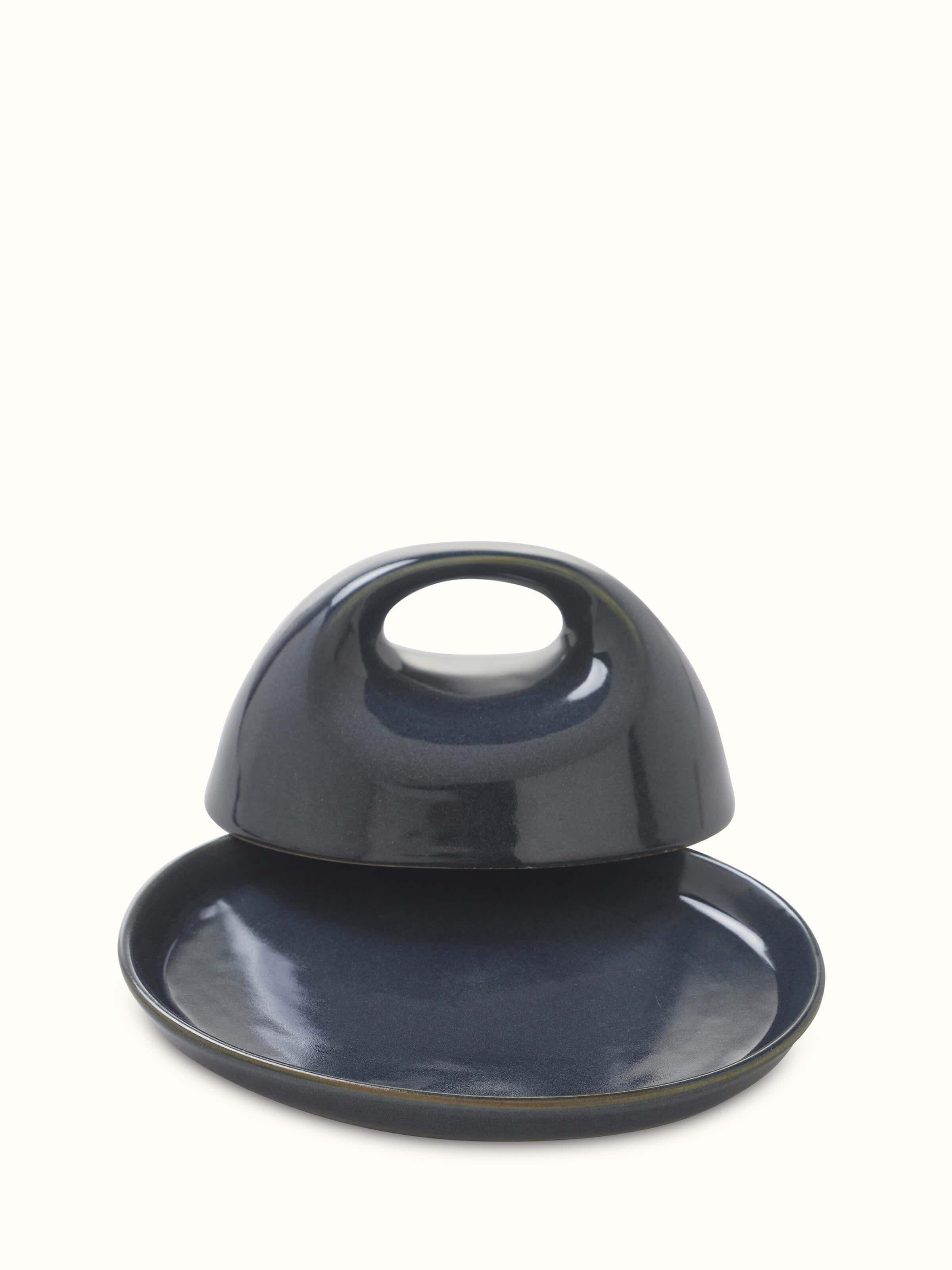 Khurja pottery ceramic butter dish with colorful floral designs and traditional craftsmanship.