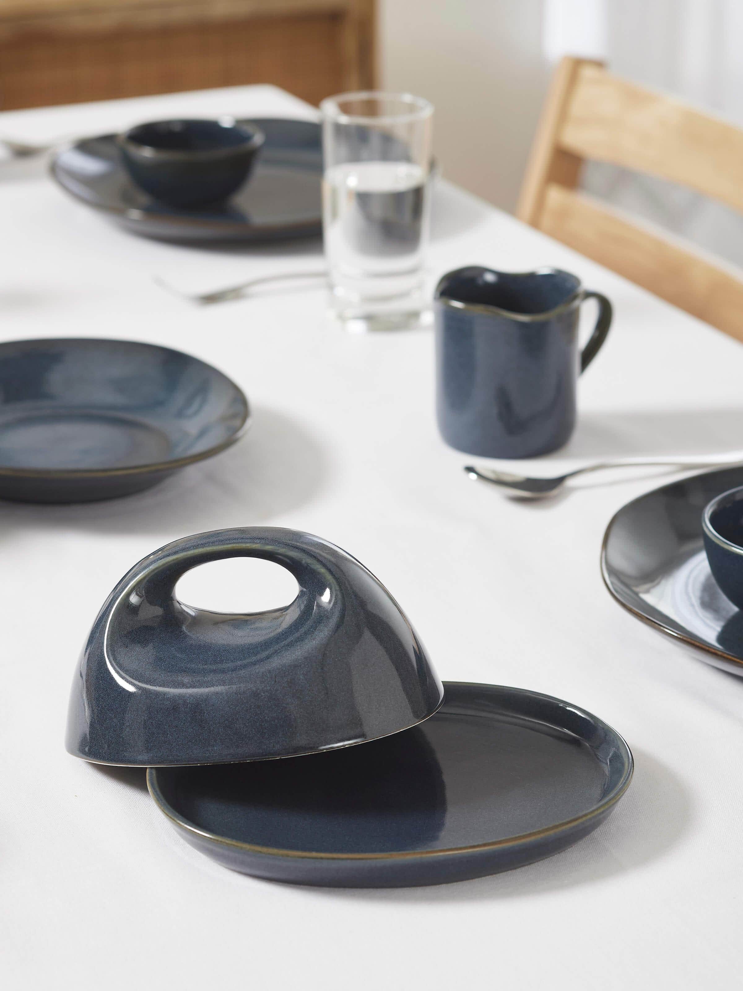 Side view of the Khurja pottery ceramic butter dish highlighting its vibrant patterns.