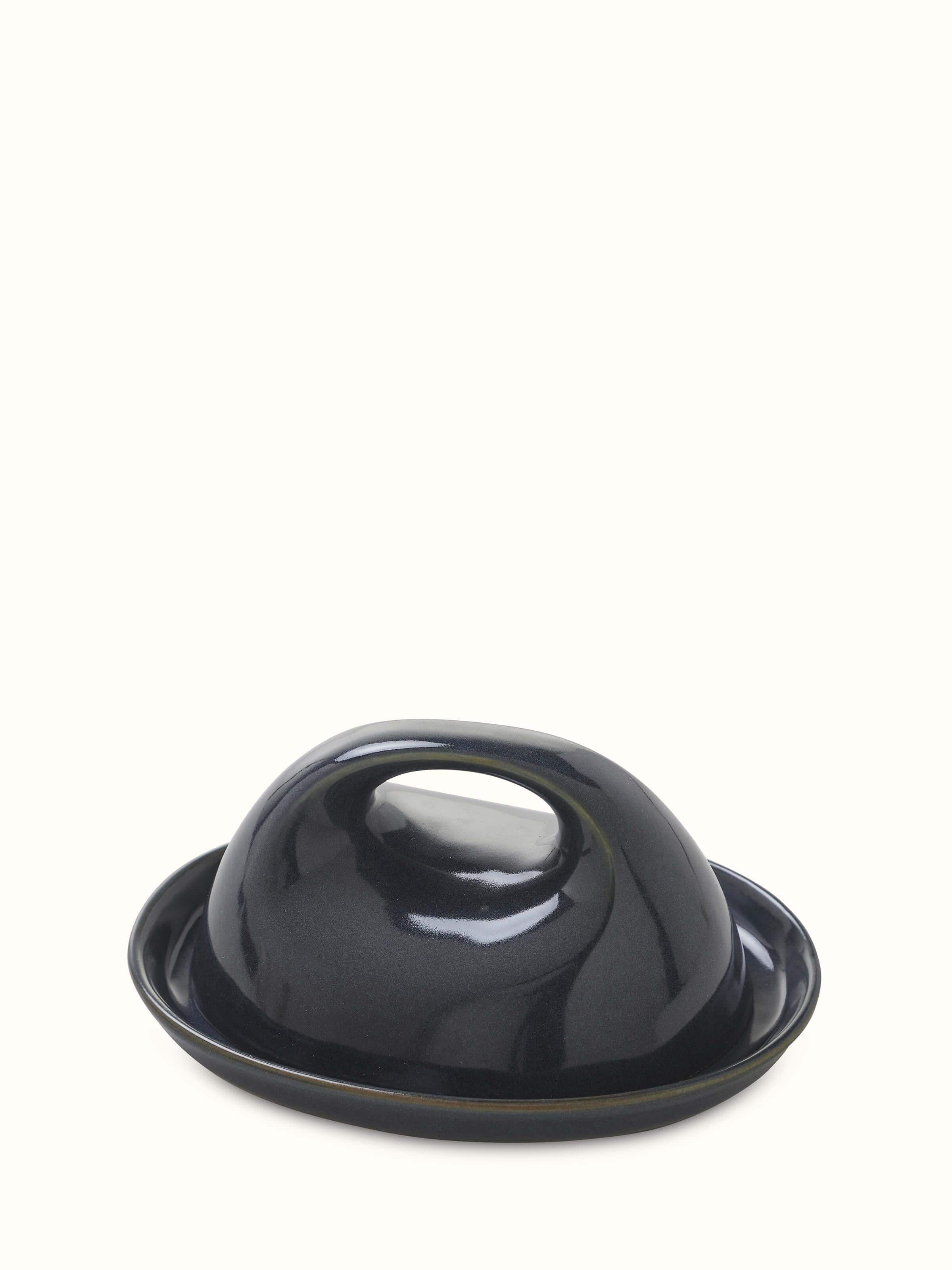 Full view of the Khurja pottery ceramic butter dish with its unique ceramic glaze and design.