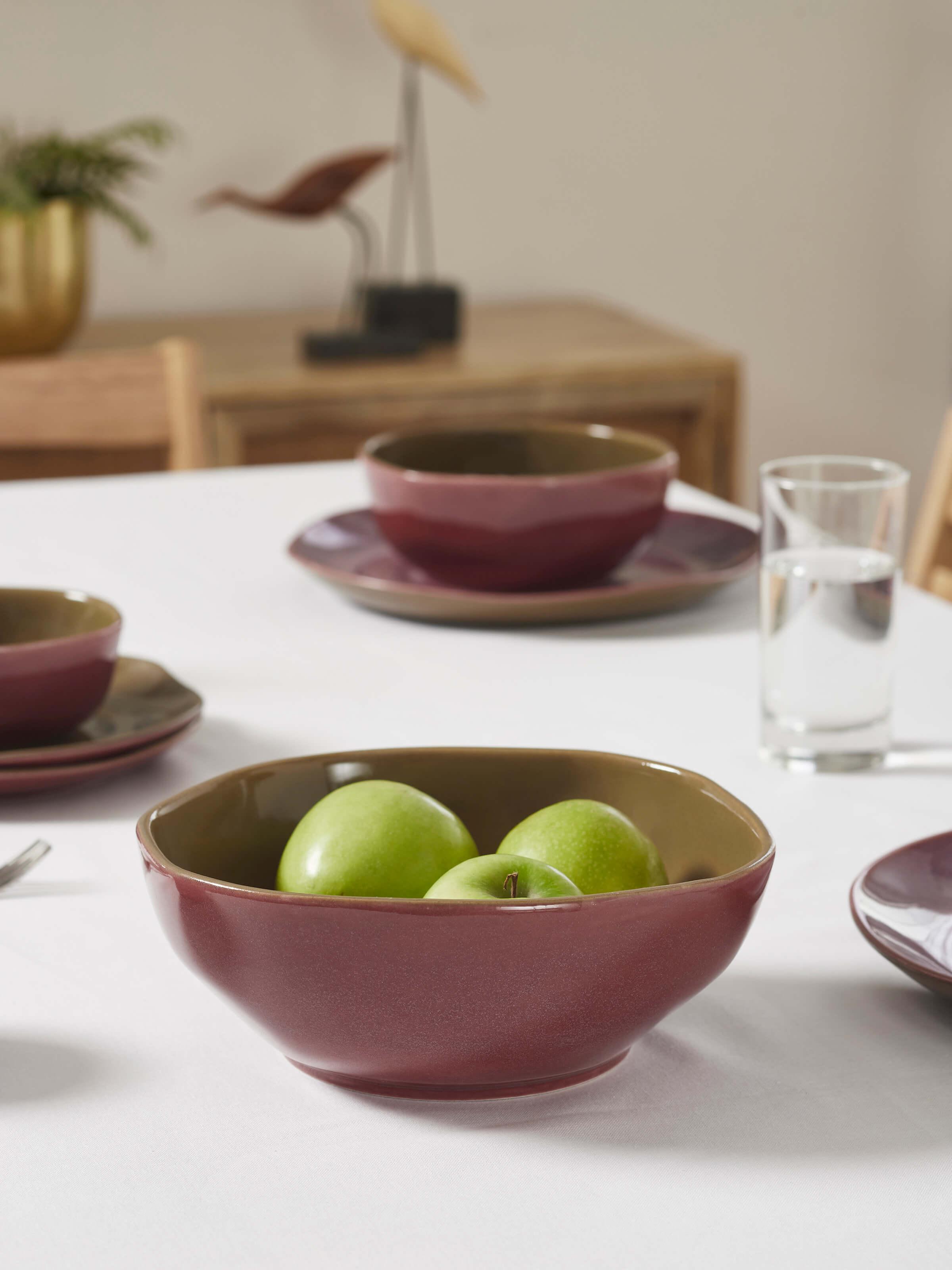 Side view of Khurja pottery ceramic serving bowls in pink (3 pcs) highlighting the smooth finish