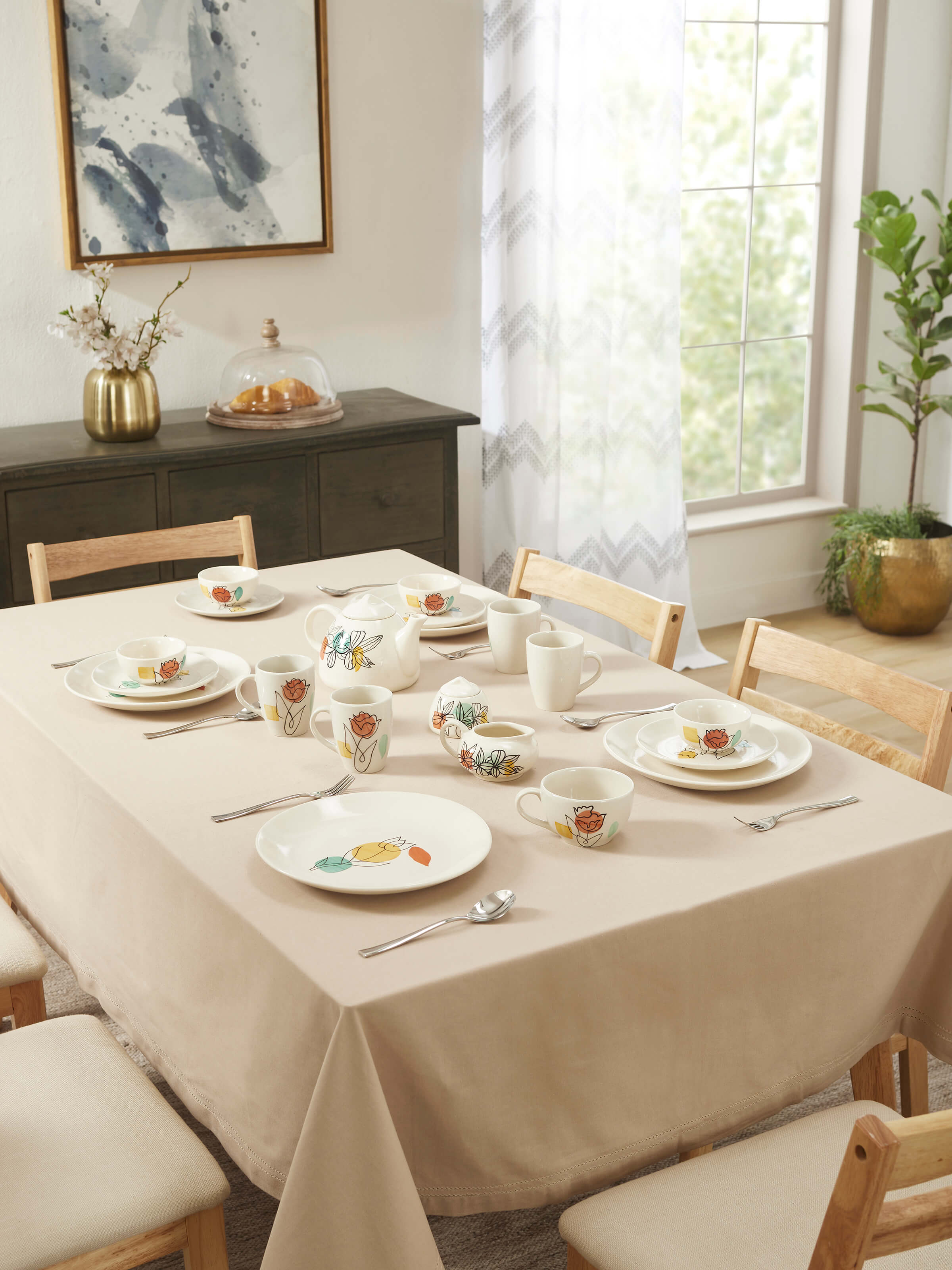 Angled view of Khurja pottery ceramic coffee mugs (4 pcs) emphasizing the smooth ceramic finish and colorful design