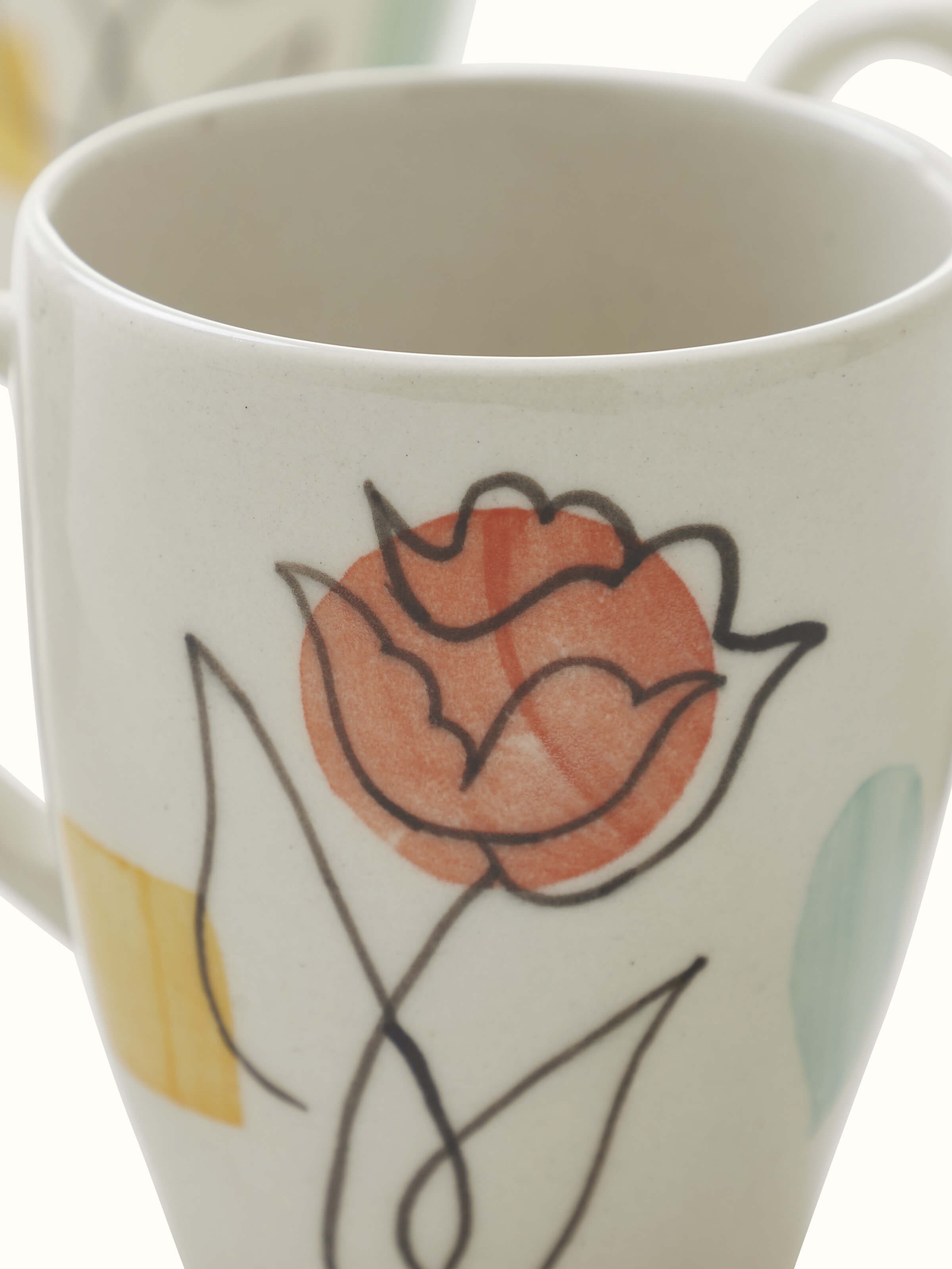 Close-up of Khurja pottery ceramic coffee mugs (4 pcs) showcasing the craftsmanship and color details