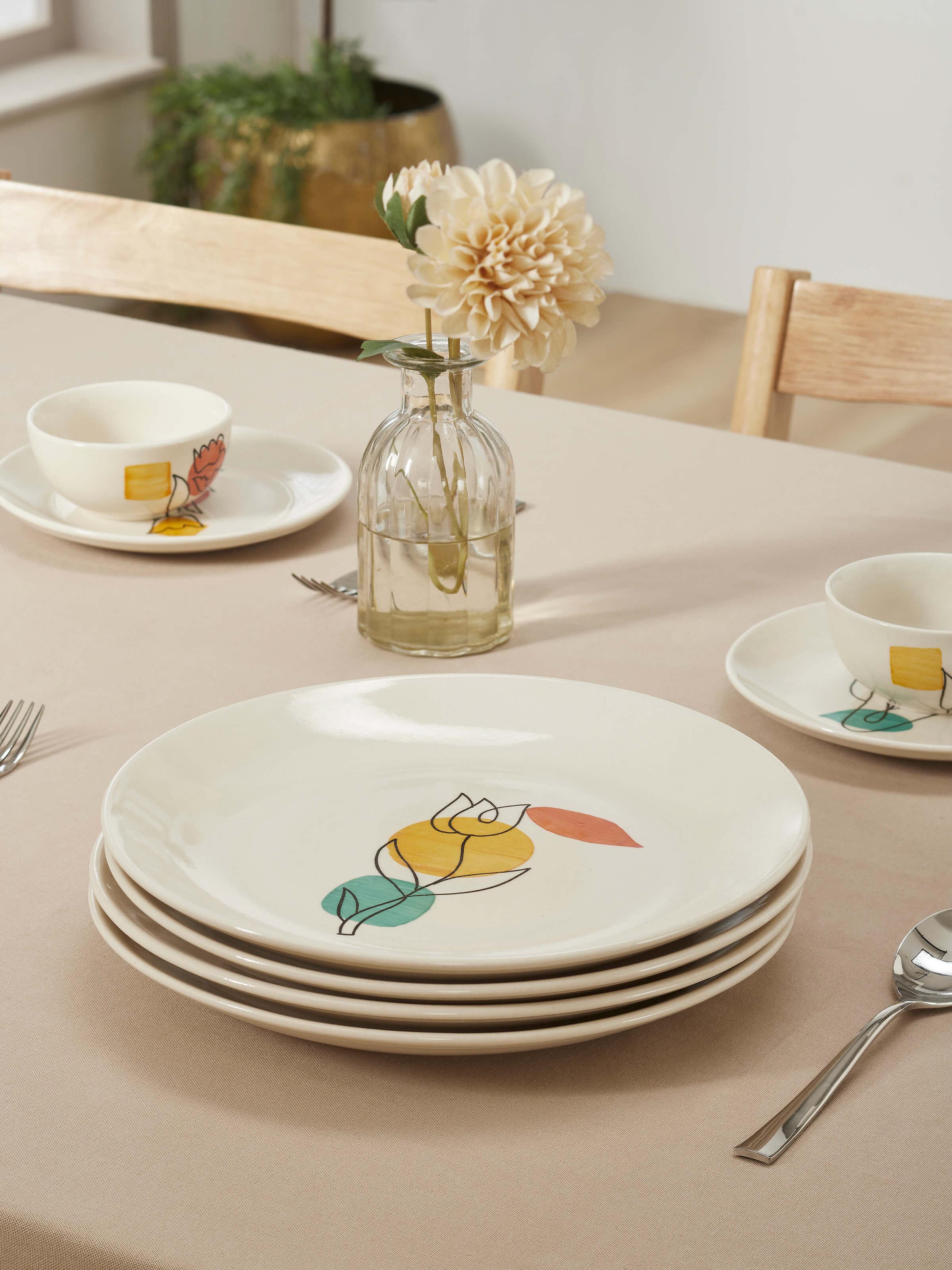 Detailed view of Khurja Pottery Ceramic Dinner Plates in Orange & White emphasizing craftsmanship.
