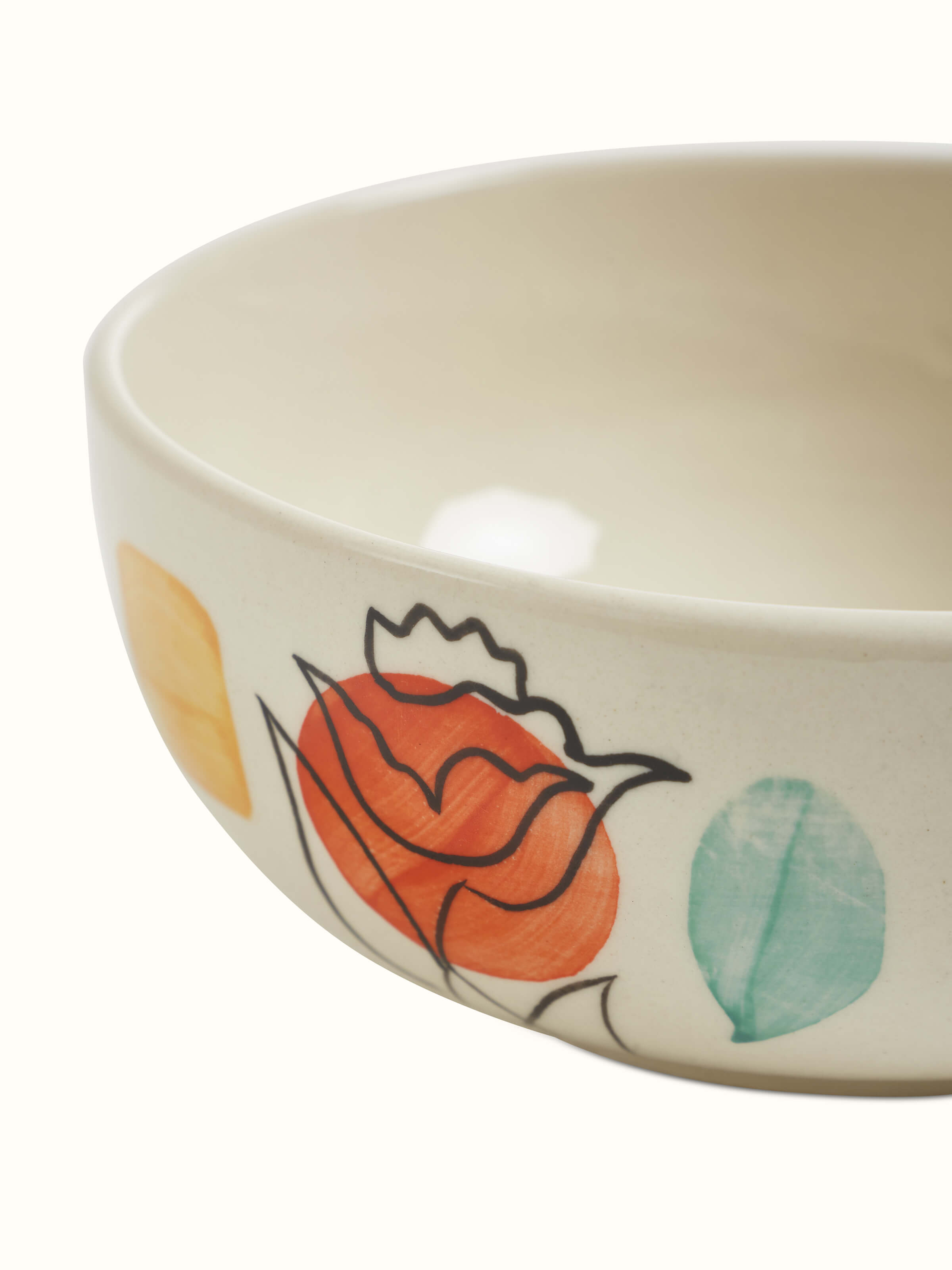 Close-up of Khurja pottery ceramic serving bowl in orange & white revealing intricate design patterns