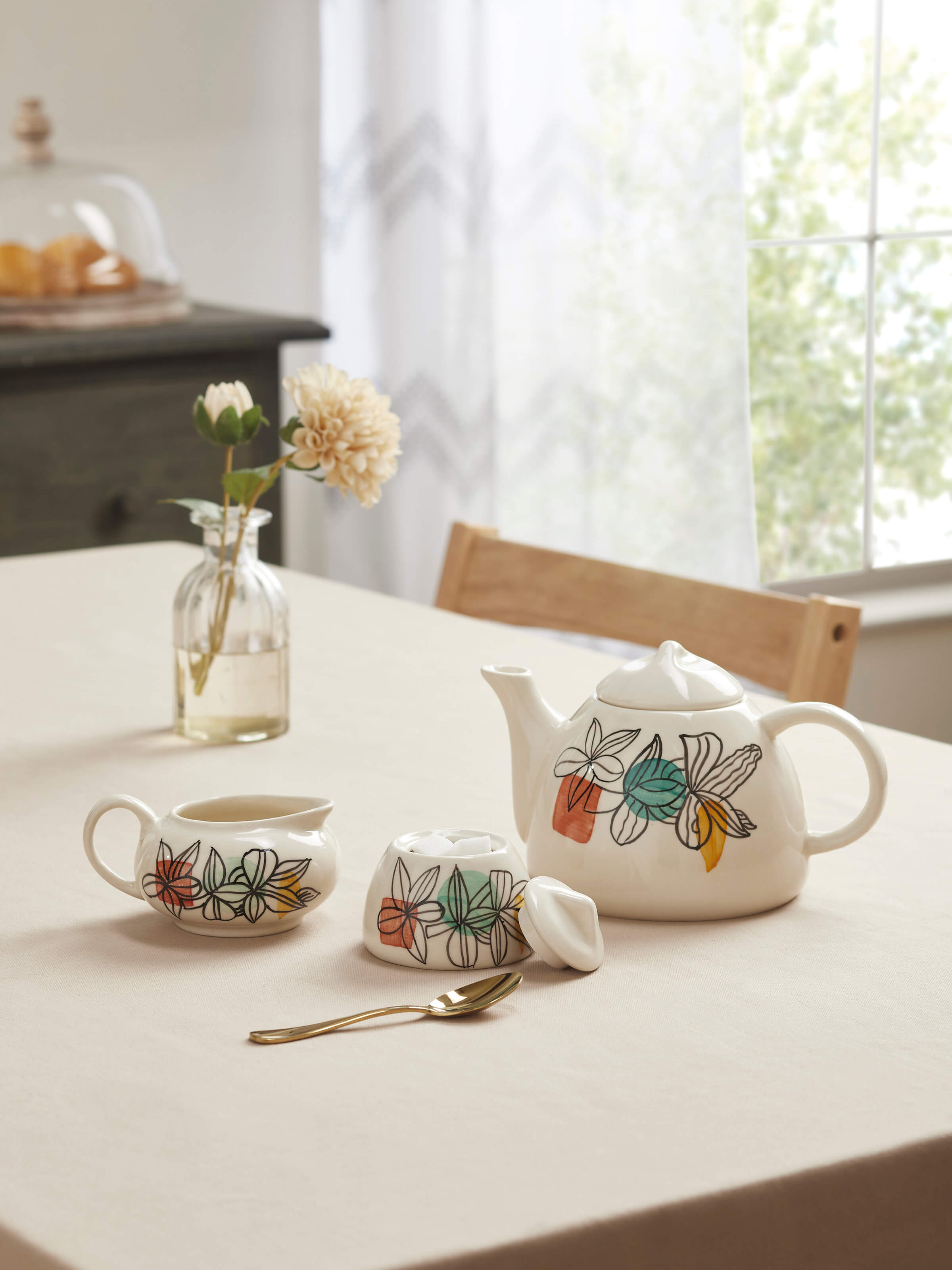 Side view of Khurja Pottery Ceramic Tea Set in white (3 pcs) highlighting the shape and design.