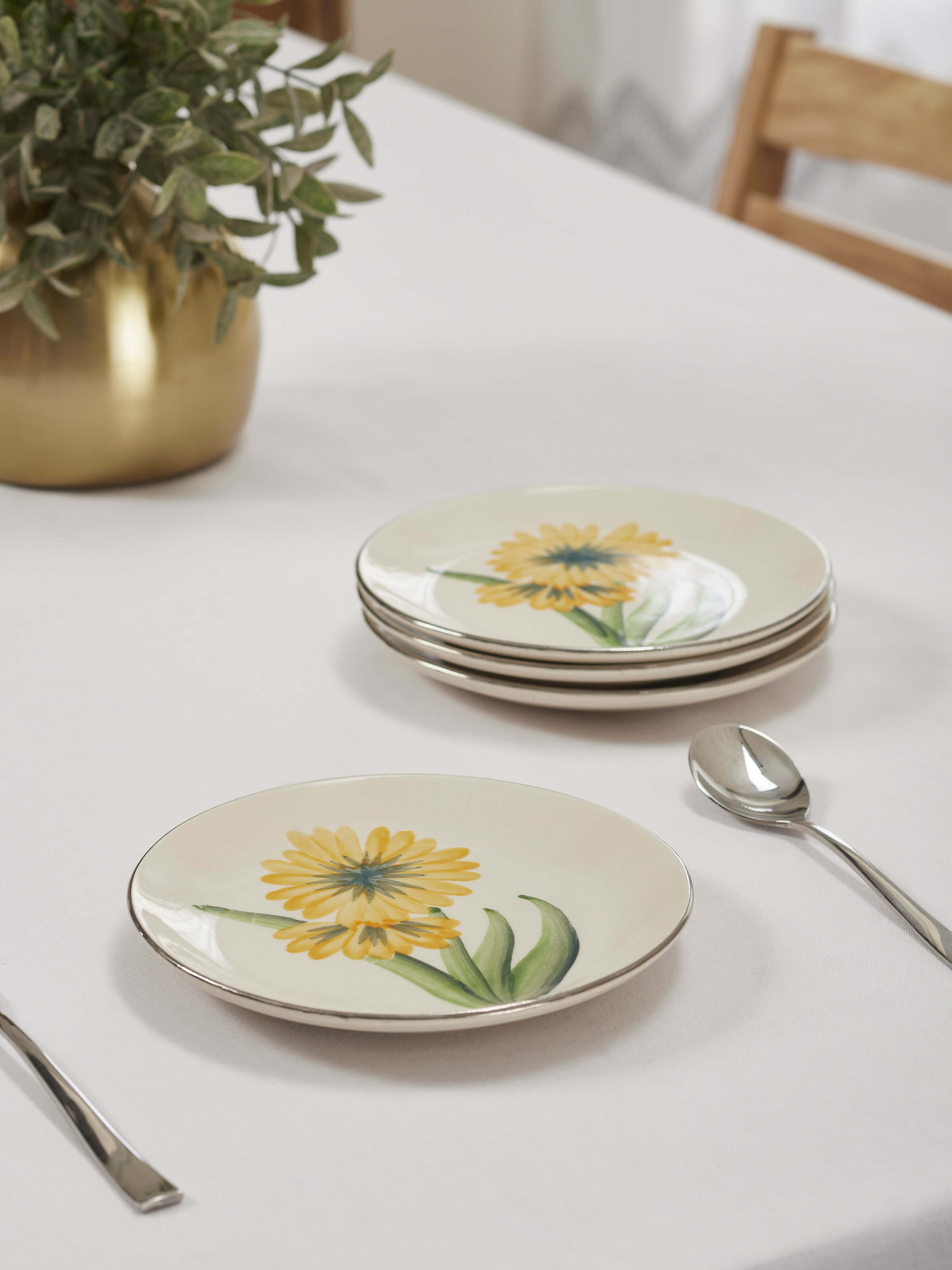 Top view of Khurja pottery ceramic salad plates set in yellow and white (4 pcs)