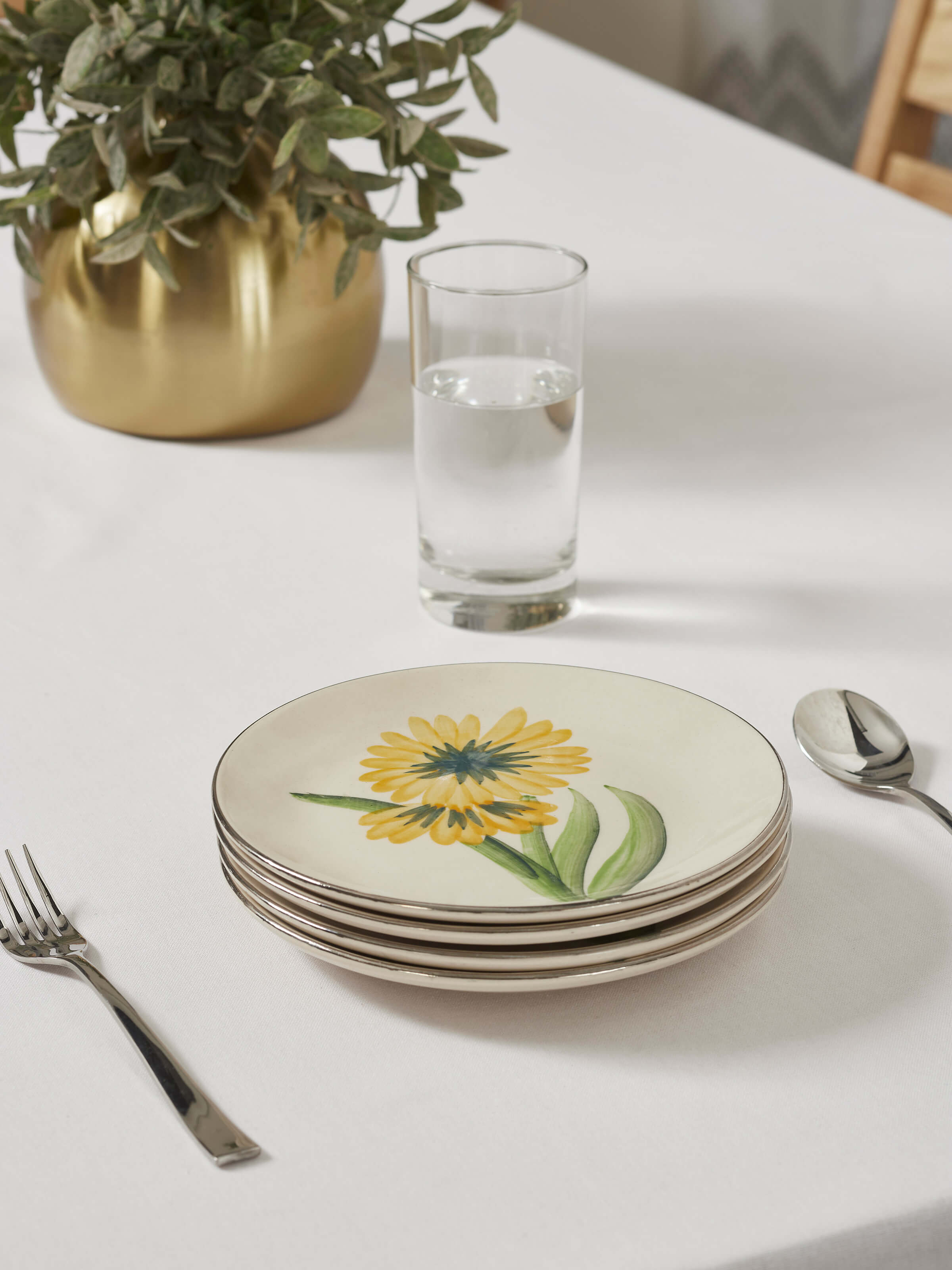 Side view of Khurja pottery ceramic salad plates in yellow and white (4 pcs)