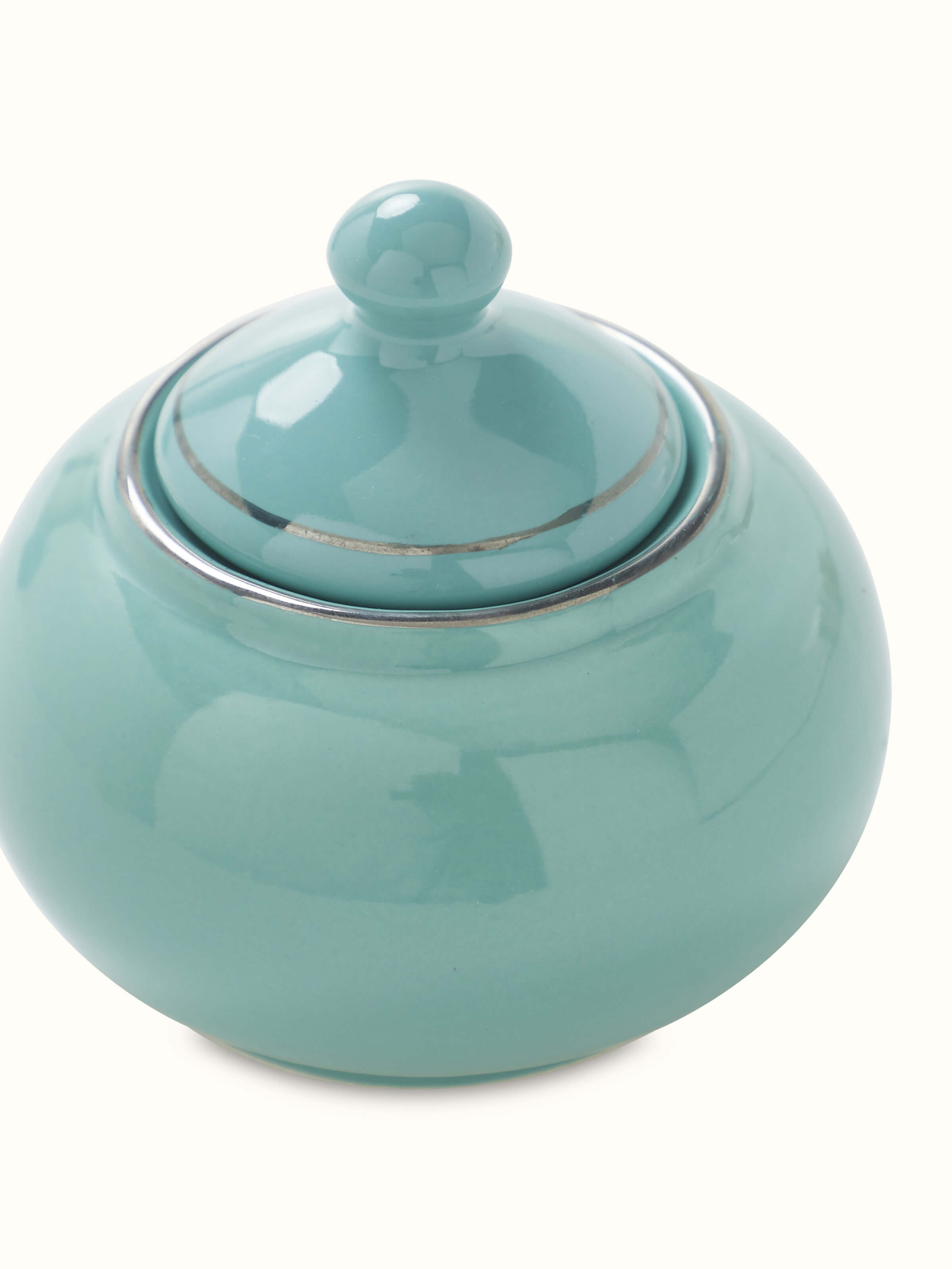 Side view of Natural Sheesham Wood Topsy Turvy Candle Holder emphasizing its height and structure.