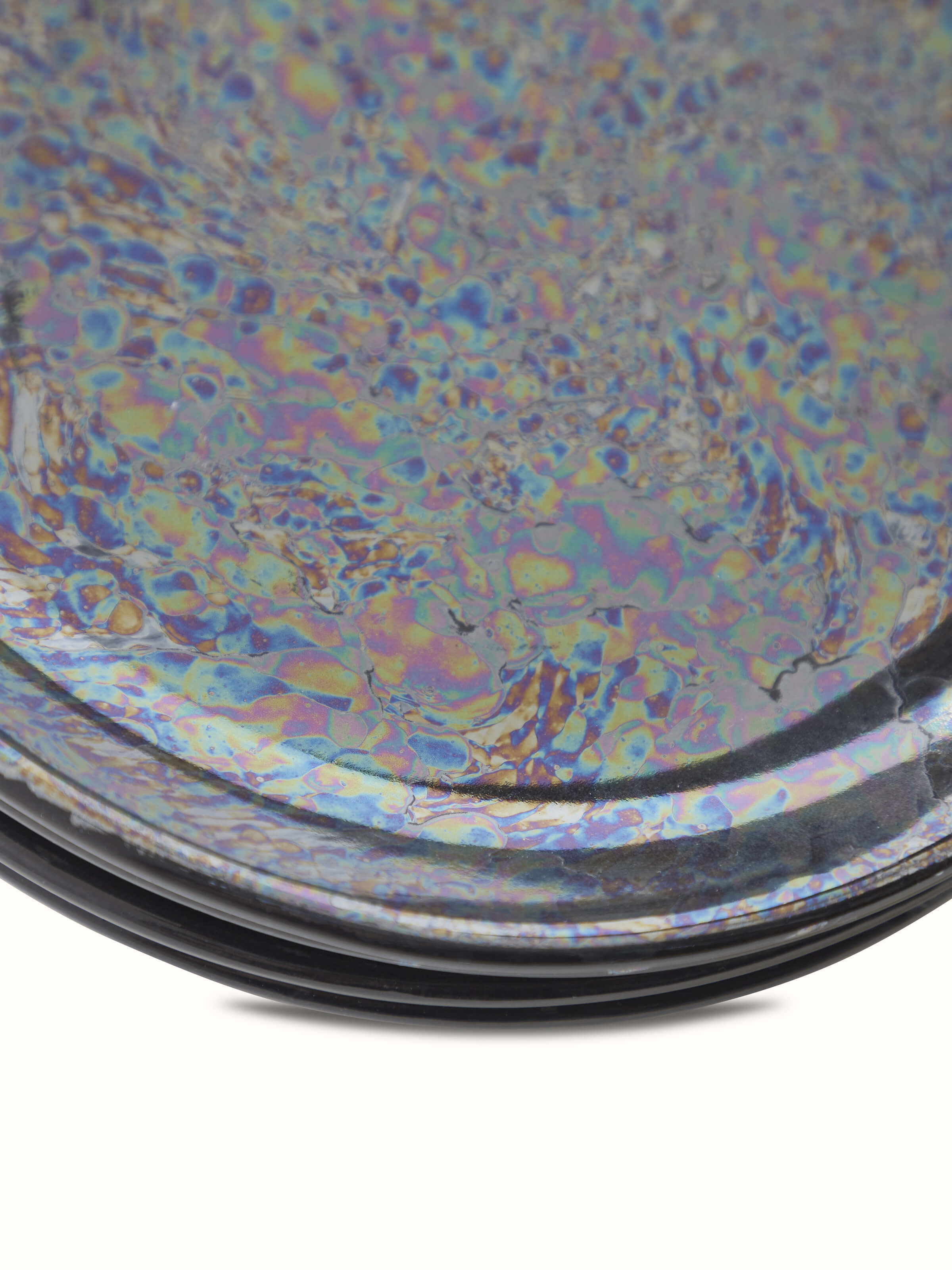 Side angle of Khurja Pottery Ceramic Salad Plates in black, showing the smooth curvature and elegant design