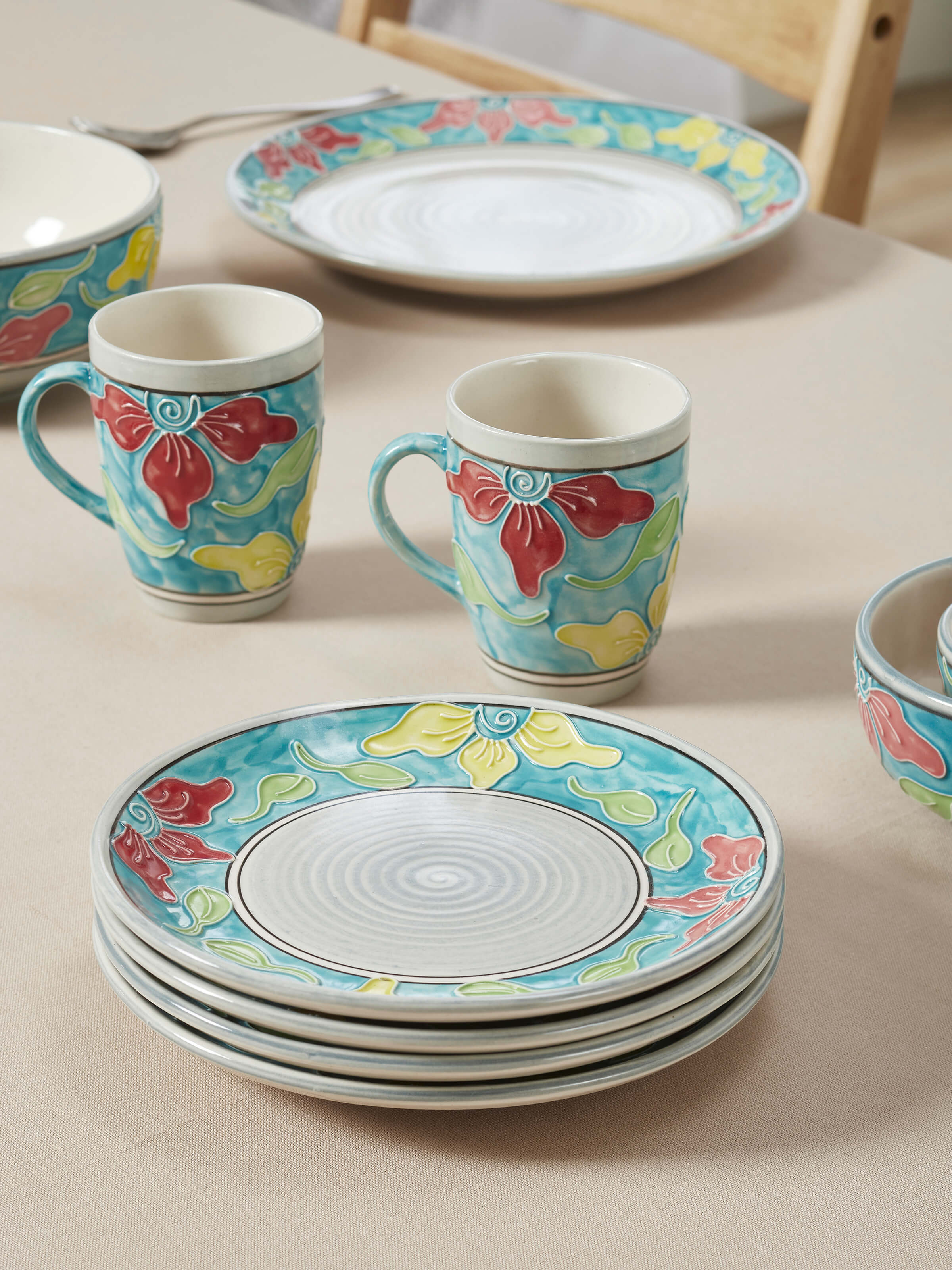 Close-up view of Khurja pottery ceramic salad plates in blue & white, set of 4, focusing on the intricate detailing.