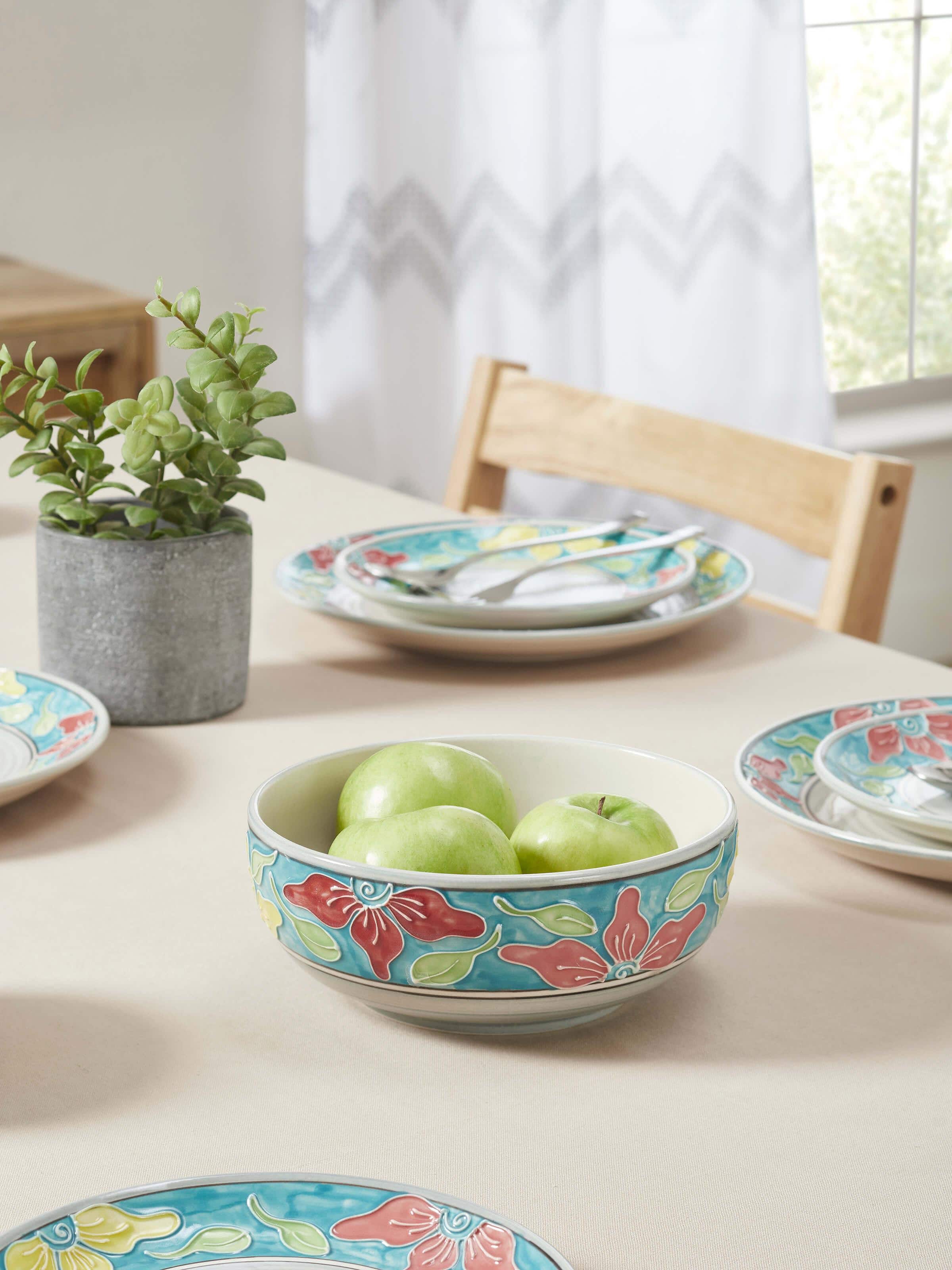 Side view of blue Khurja pottery ceramic serving bowl emphasizing its detailed craftsmanship and color