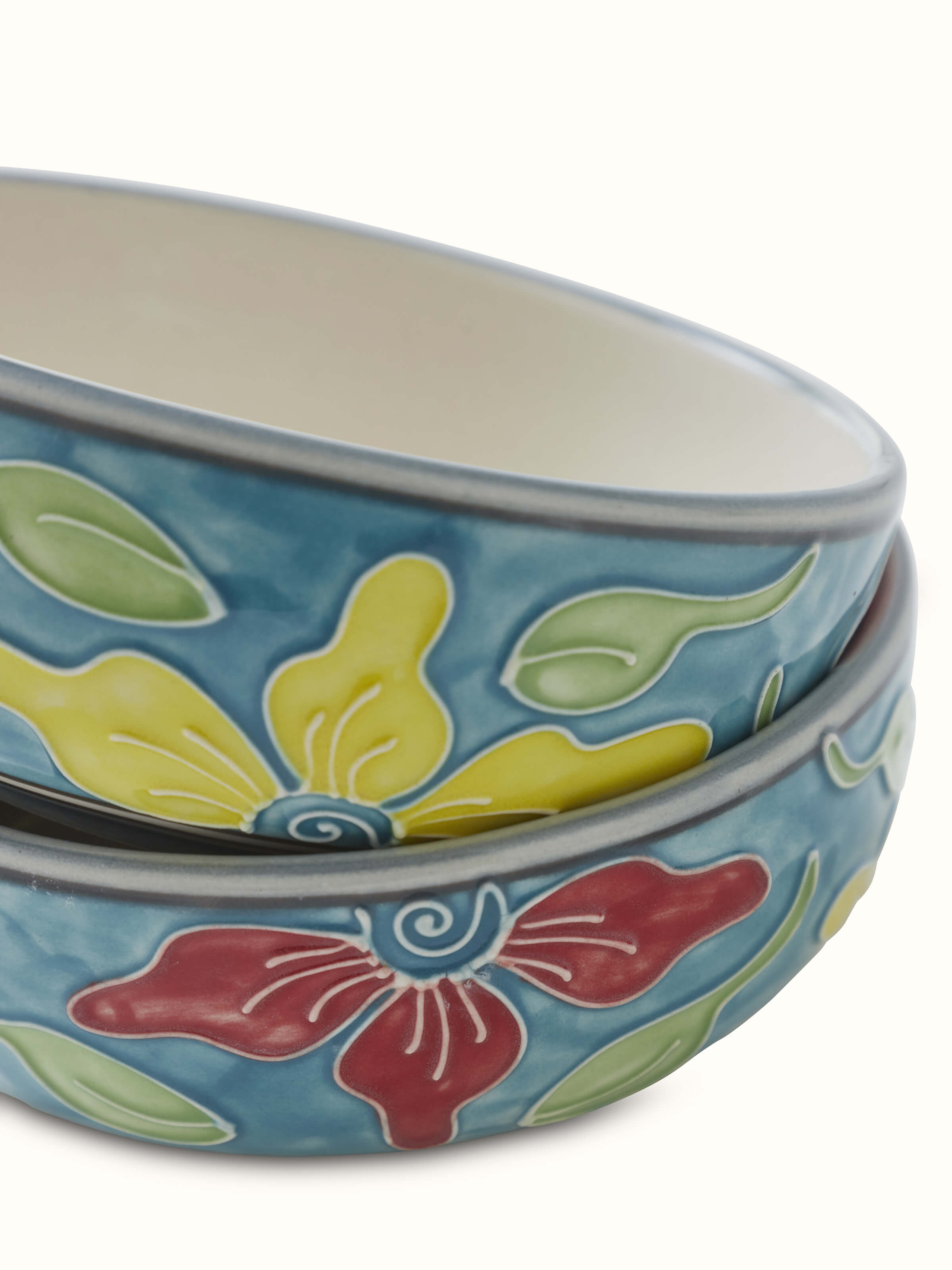 Back view of Khurja pottery ceramic dinner bowls in blue and white, showing base design and durability.