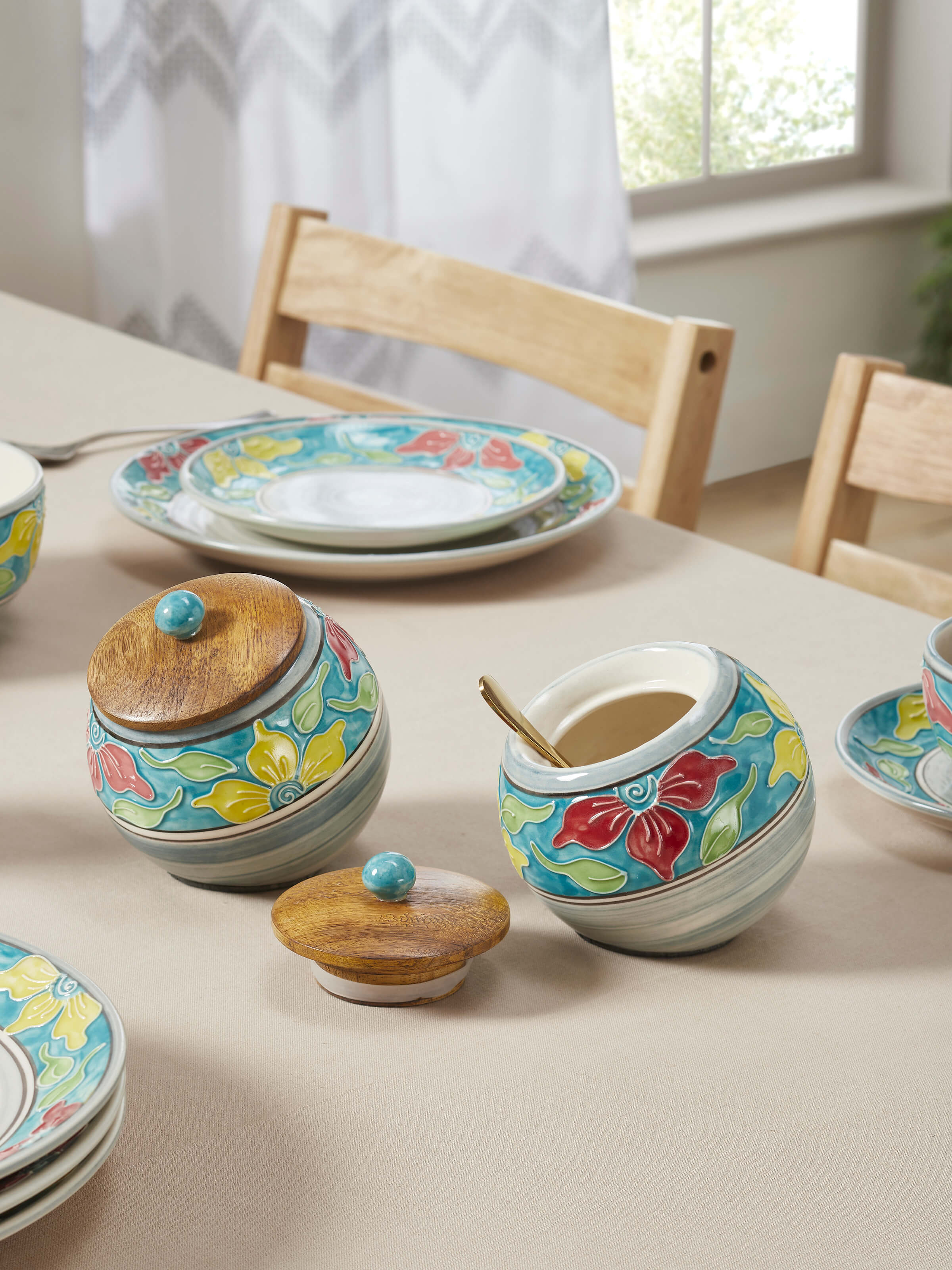 Side view of Khurja pottery ceramic jars (2 pcs) showing decorative patterns and craftsmanship