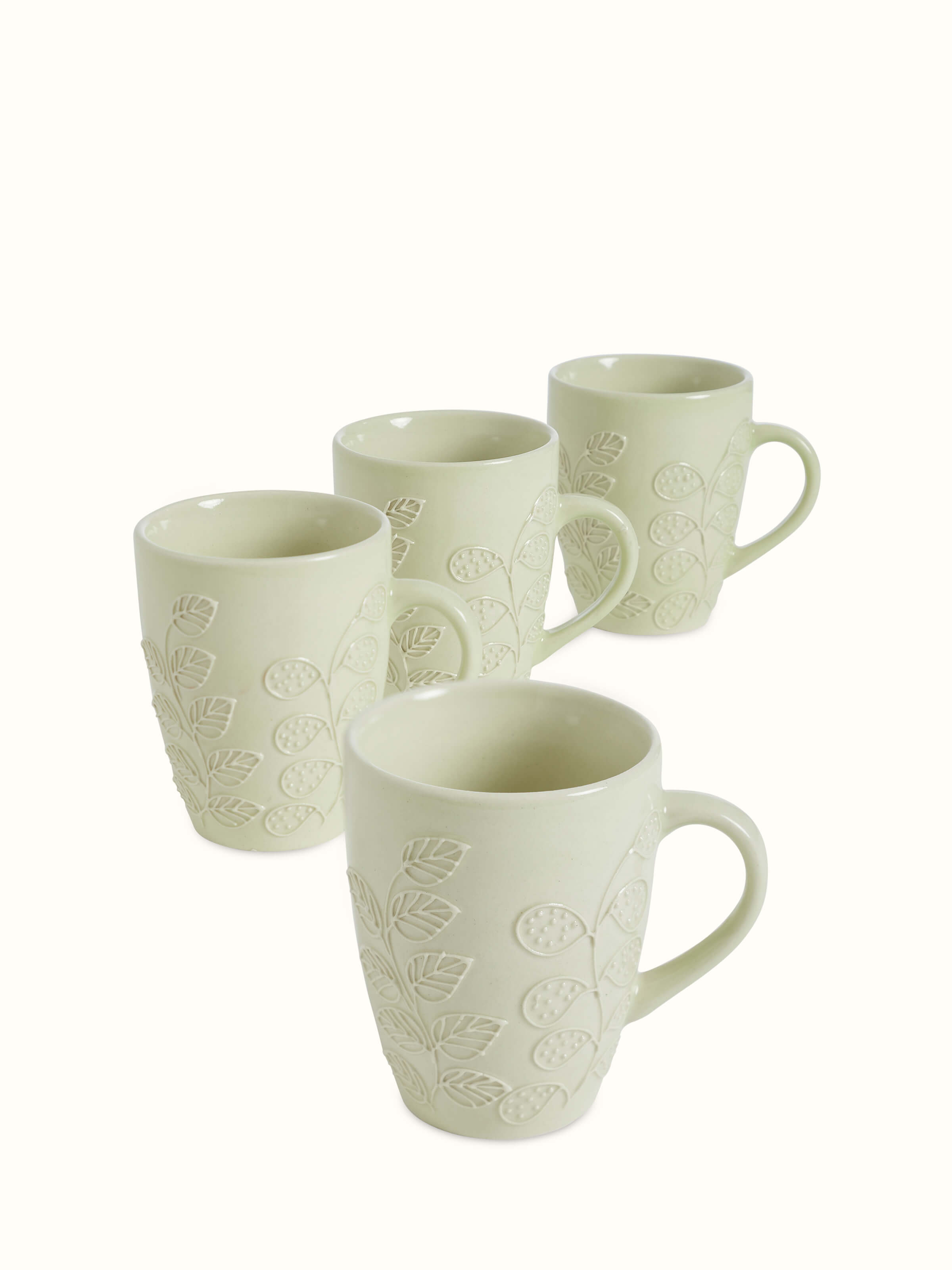 Close-up of Khurja pottery ceramic simple coffee mugs in white, highlighting the polished finish and quality craftsmanship