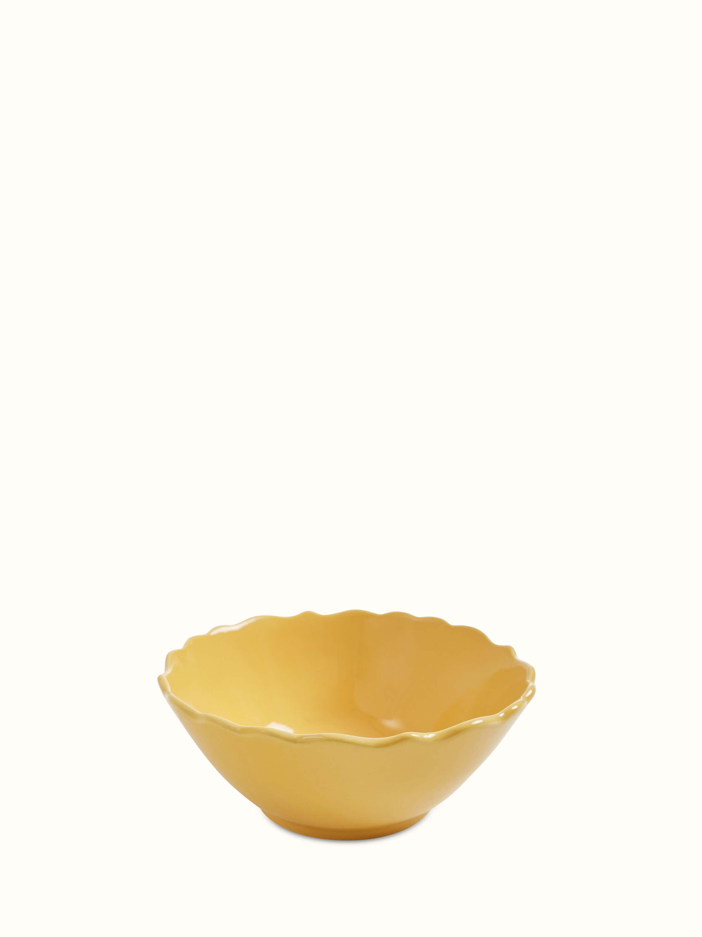 Front view of Khurja pottery ceramic serving bowl in yellow, showcasing its traditional design and color.