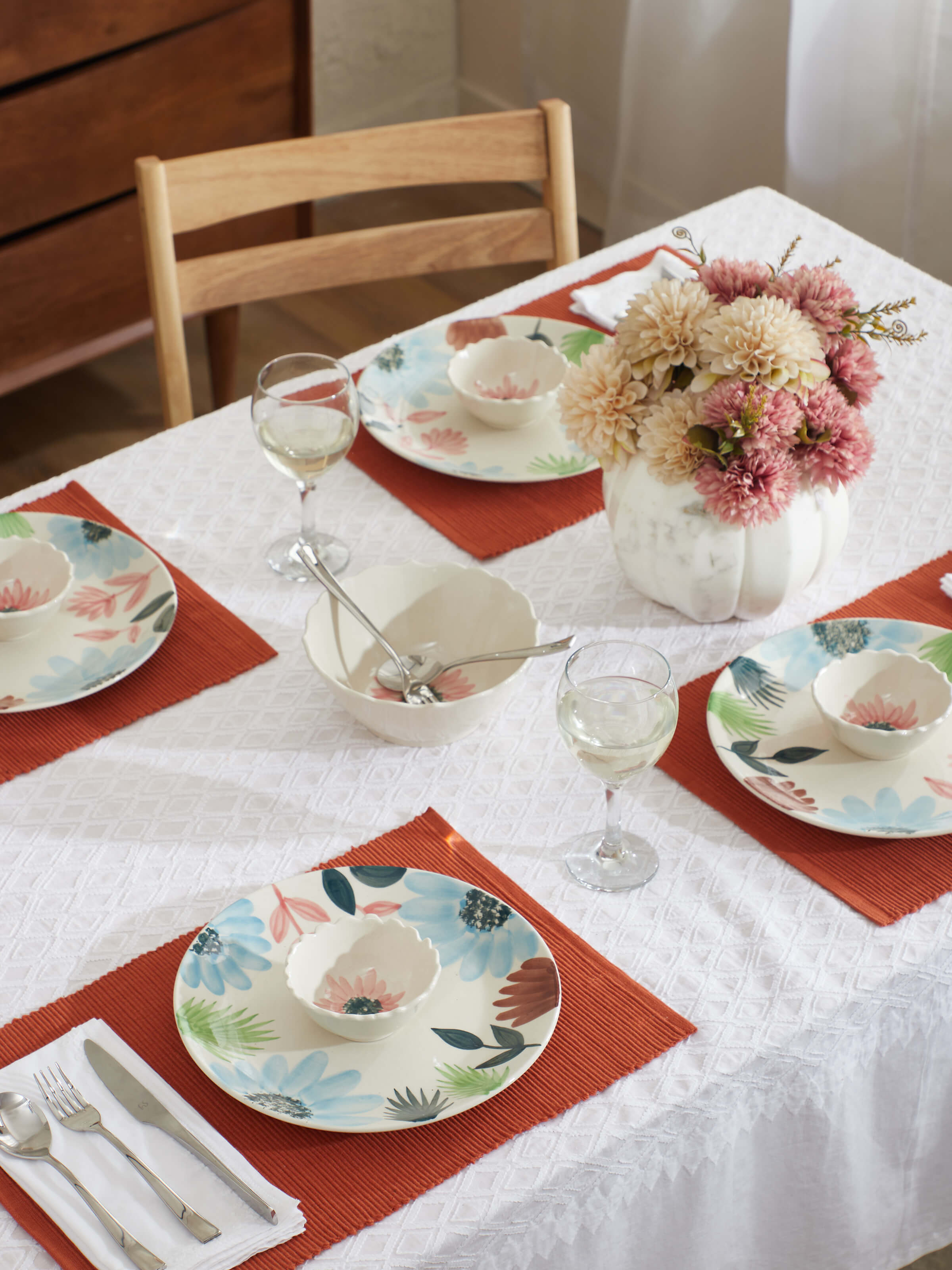 Angled view of Khurja Pottery Ceramic Dinner Plates Multicolor (4 pcs), showcasing the intricate designs and colors