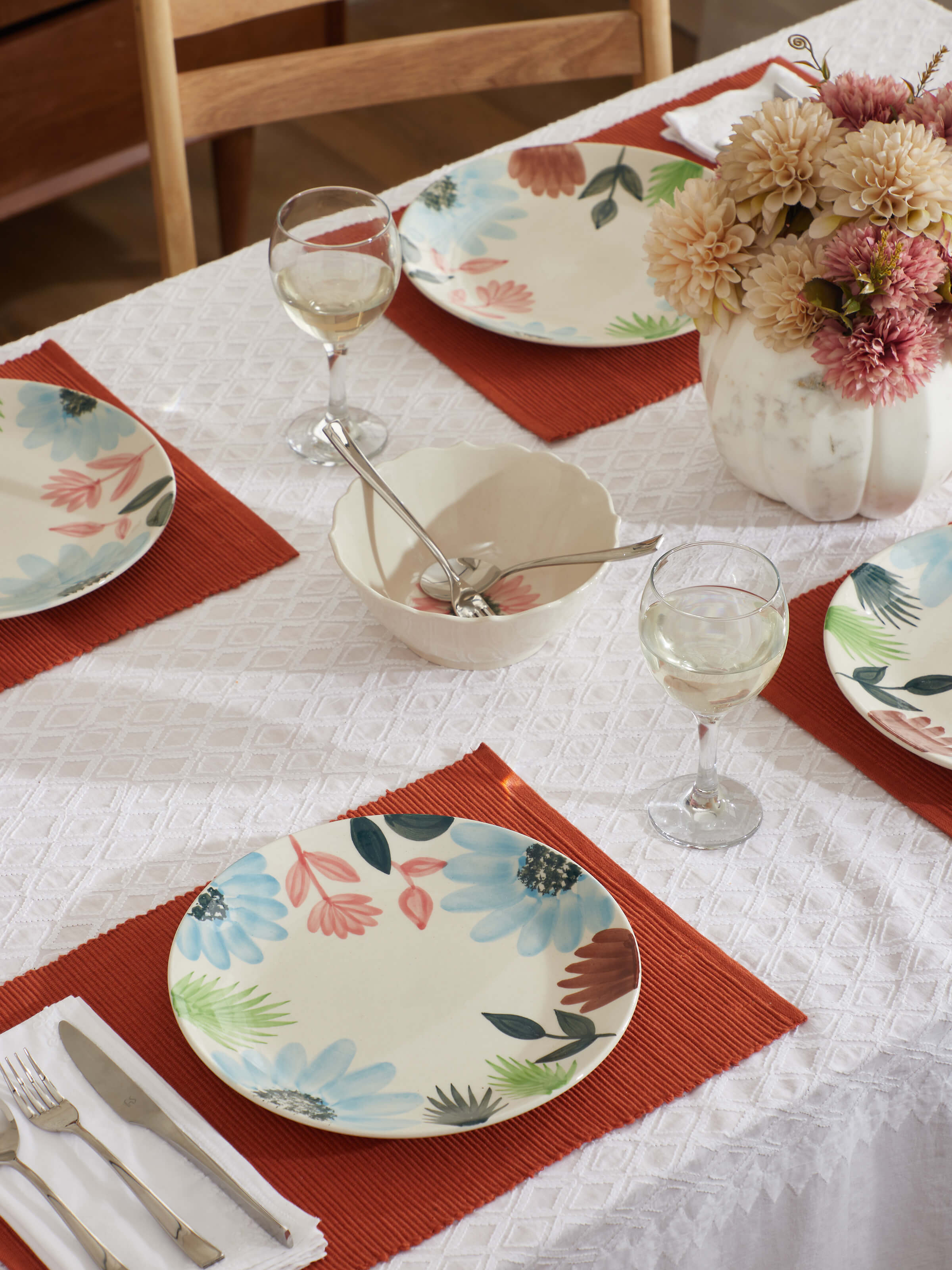 Side view of Khurja Pottery Ceramic Dinner Plates Multicolor (4 pcs), highlighting the plate edges and colors