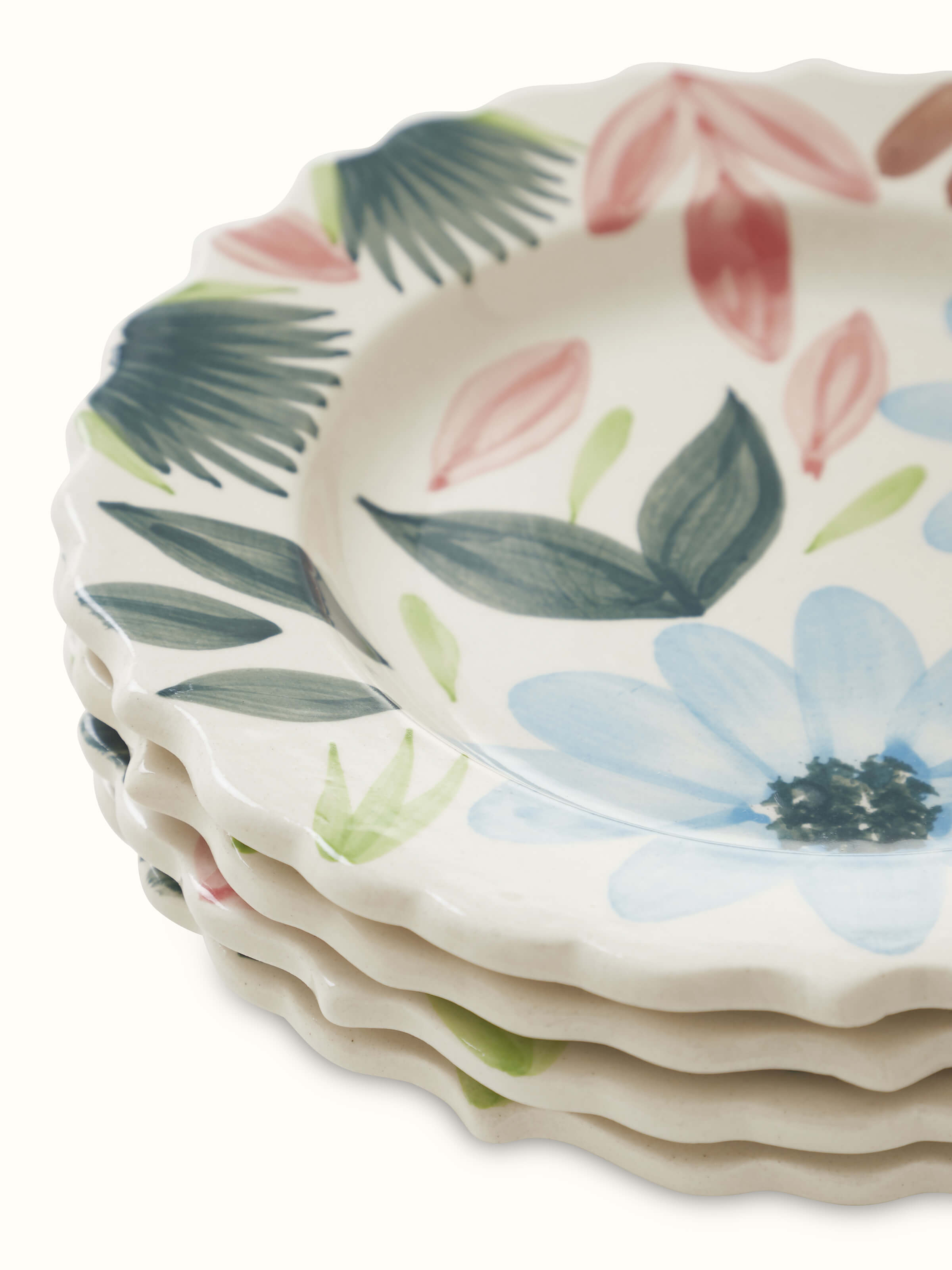 Close-up view of Khurja pottery ceramic salad plates in multicolor (4 pcs) focusing on the detailed hand-painted patterns and textures