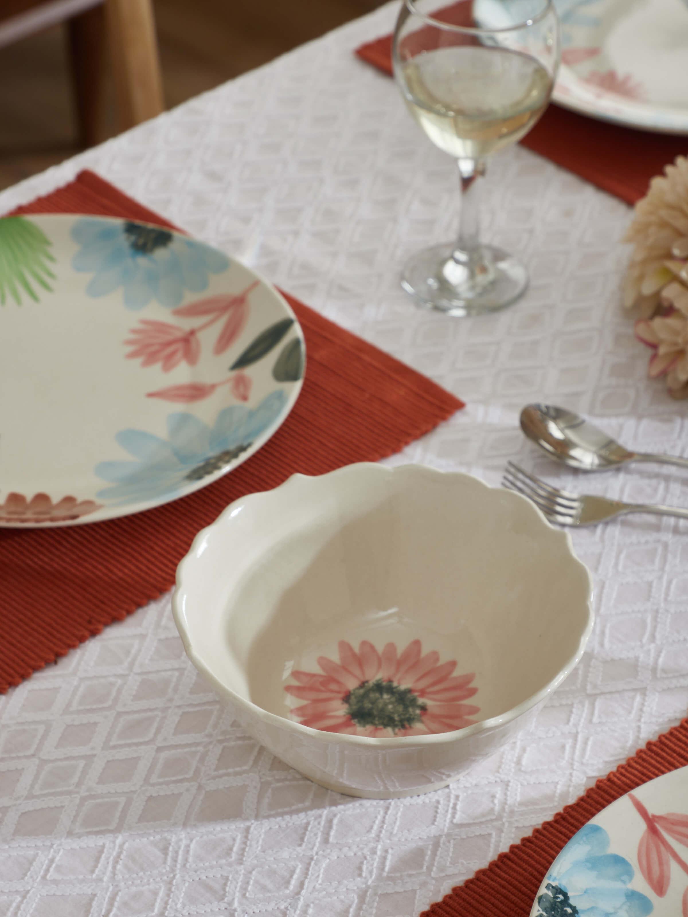 Side view of Khurja pottery ceramic serving bowl in plain white.