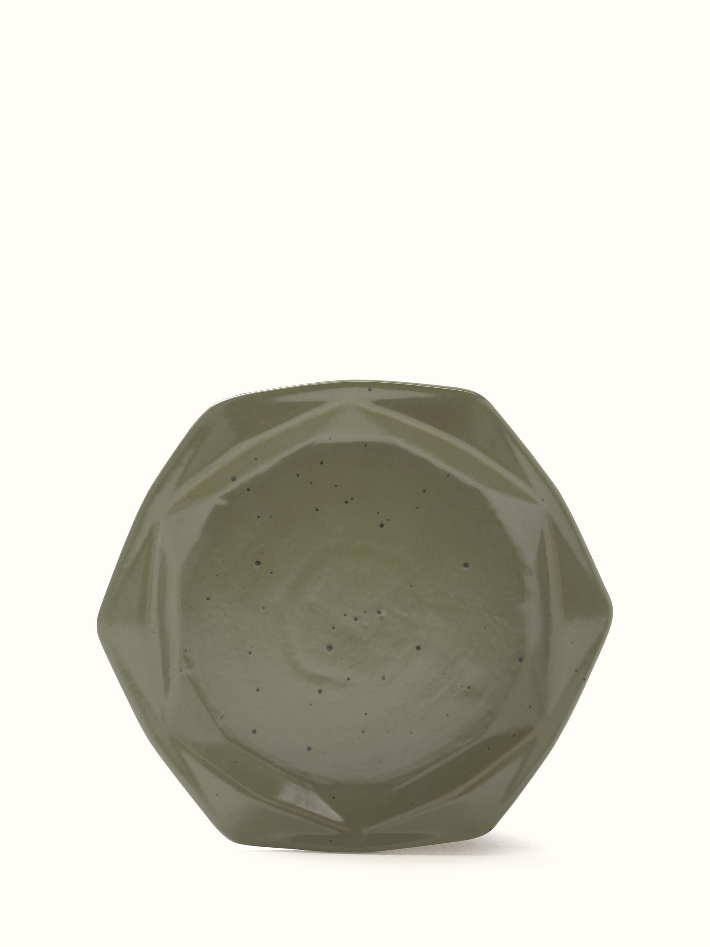 Angle view of green Khurja pottery ceramic salad plates (4 pcs) displaying sturdy construction