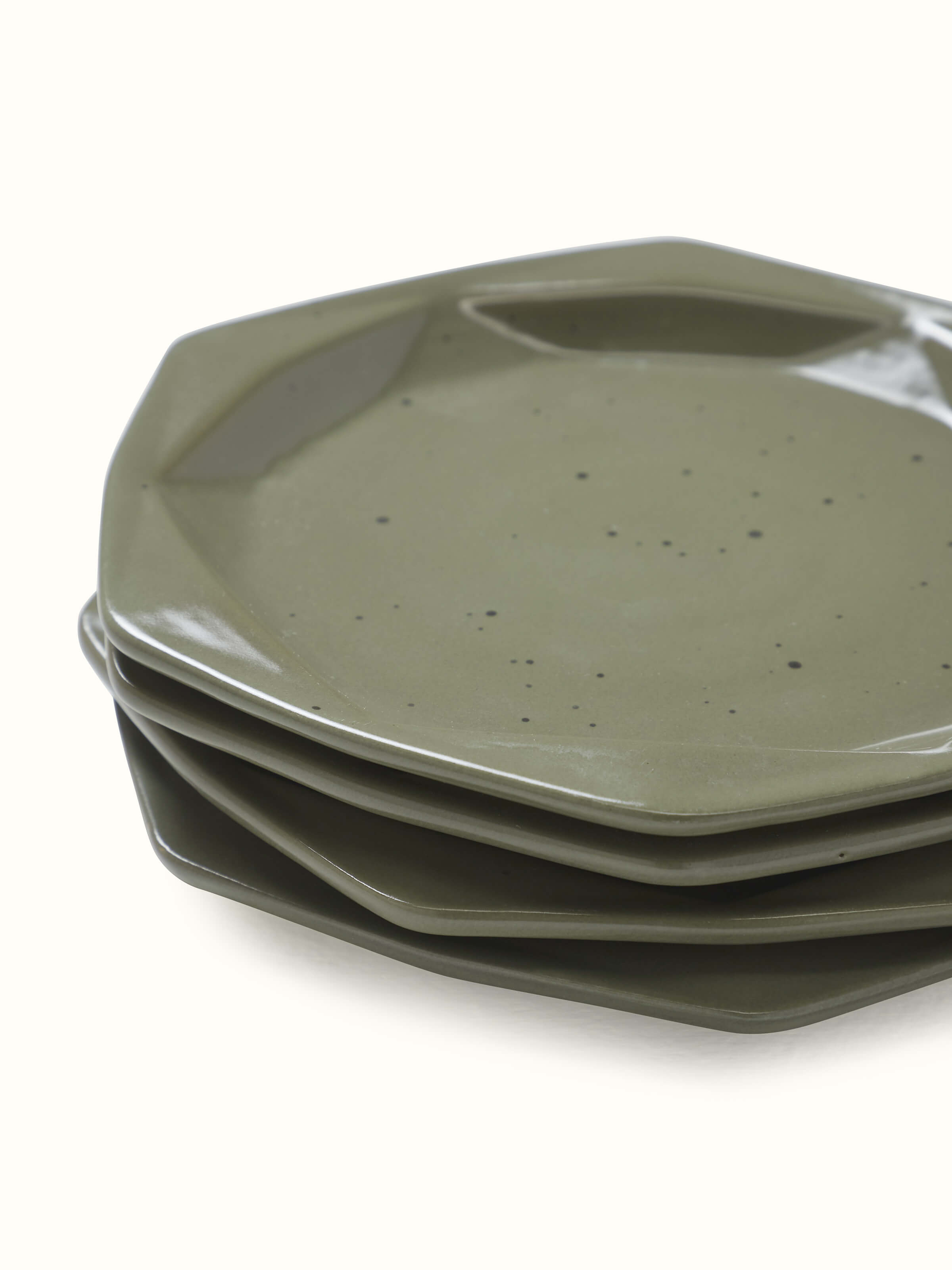 Detailed close-up of green Khurja pottery ceramic salad plates (4 pcs) focusing on craftsmanship