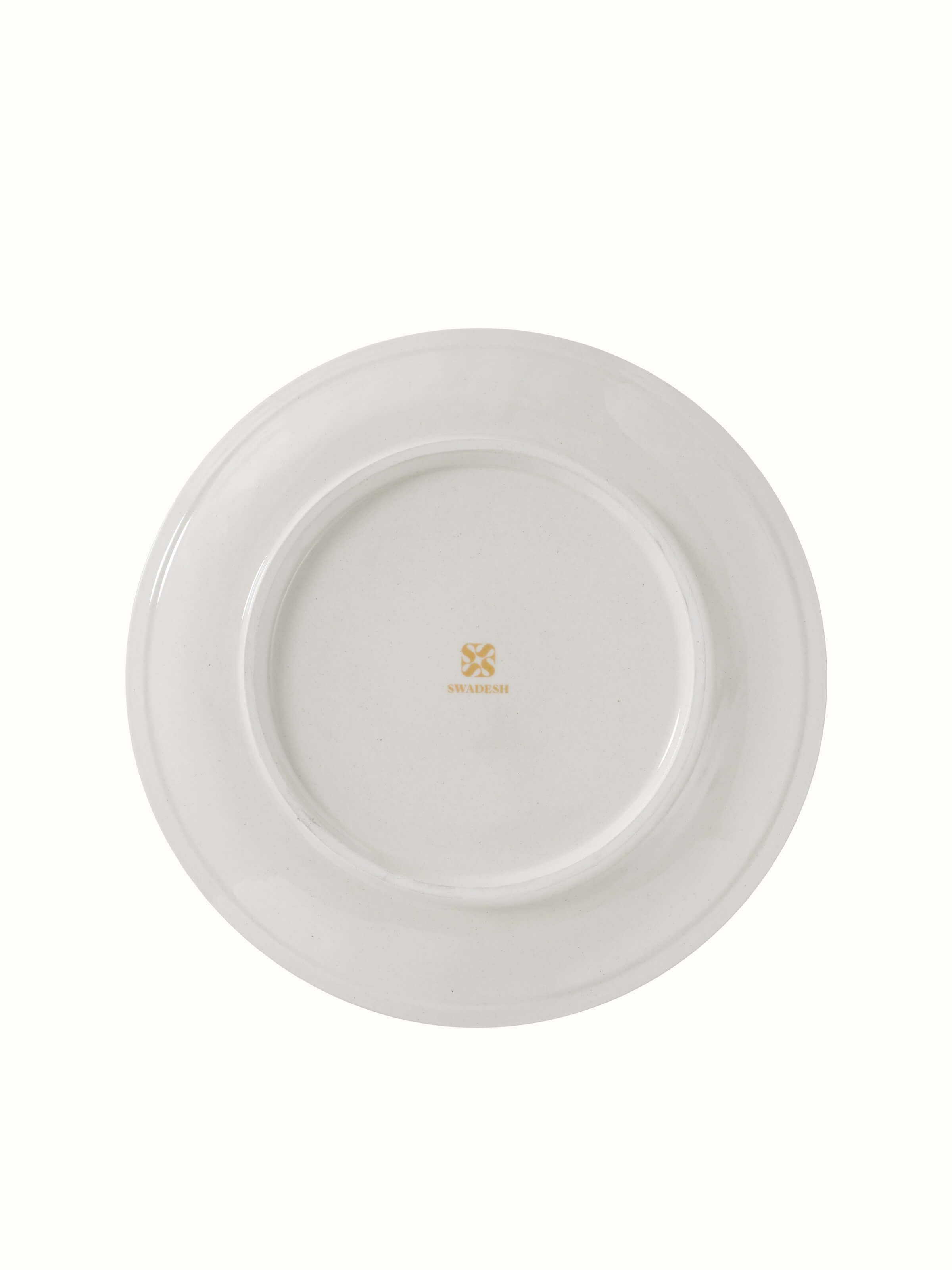 Angled view of Khurja pottery ceramic dinner plates (4 pcs) emphasizing their traditional patterns