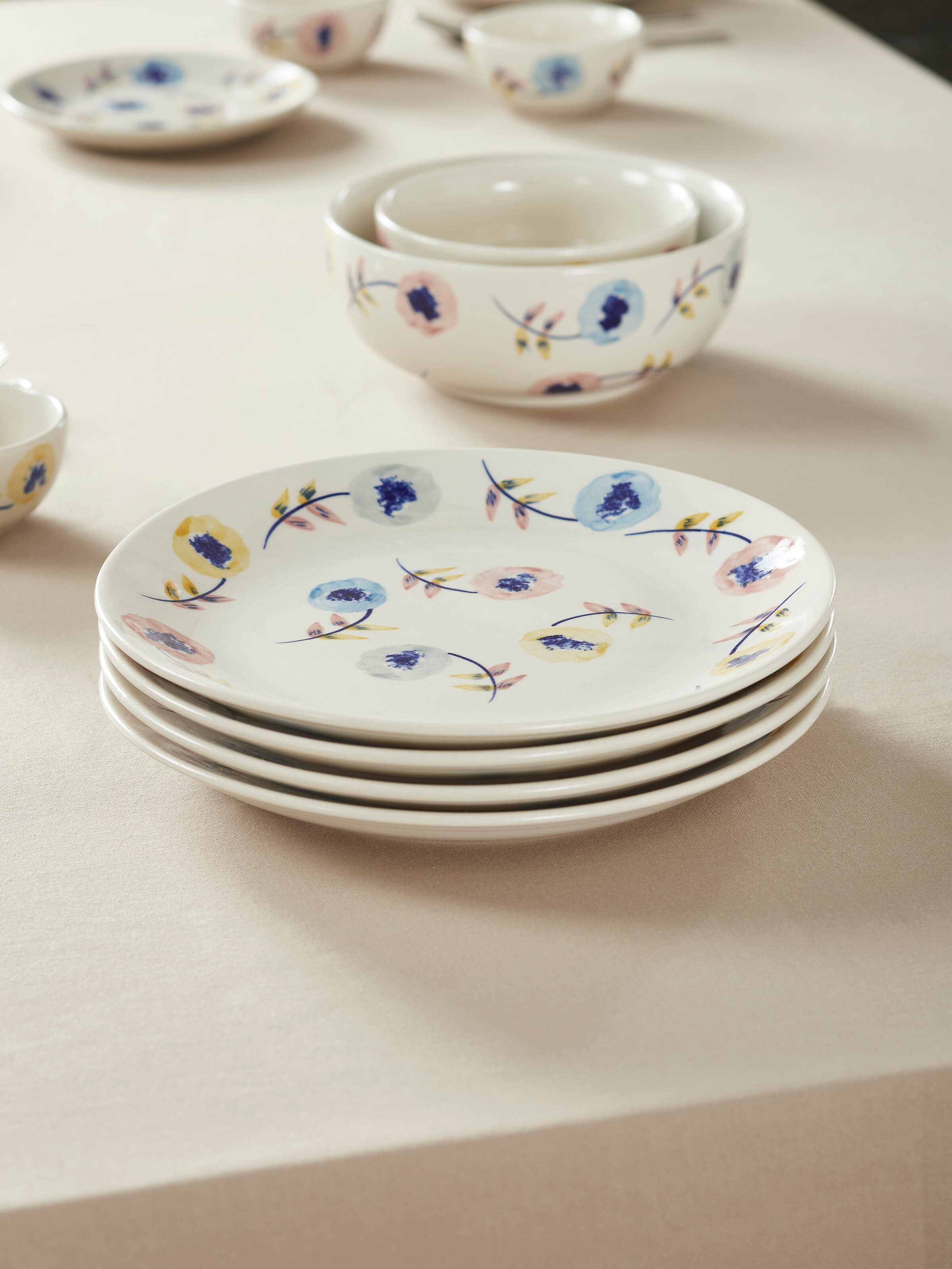 Side view of Khurja pottery ceramic dinner plates (4 pcs) highlighting their intricate designs