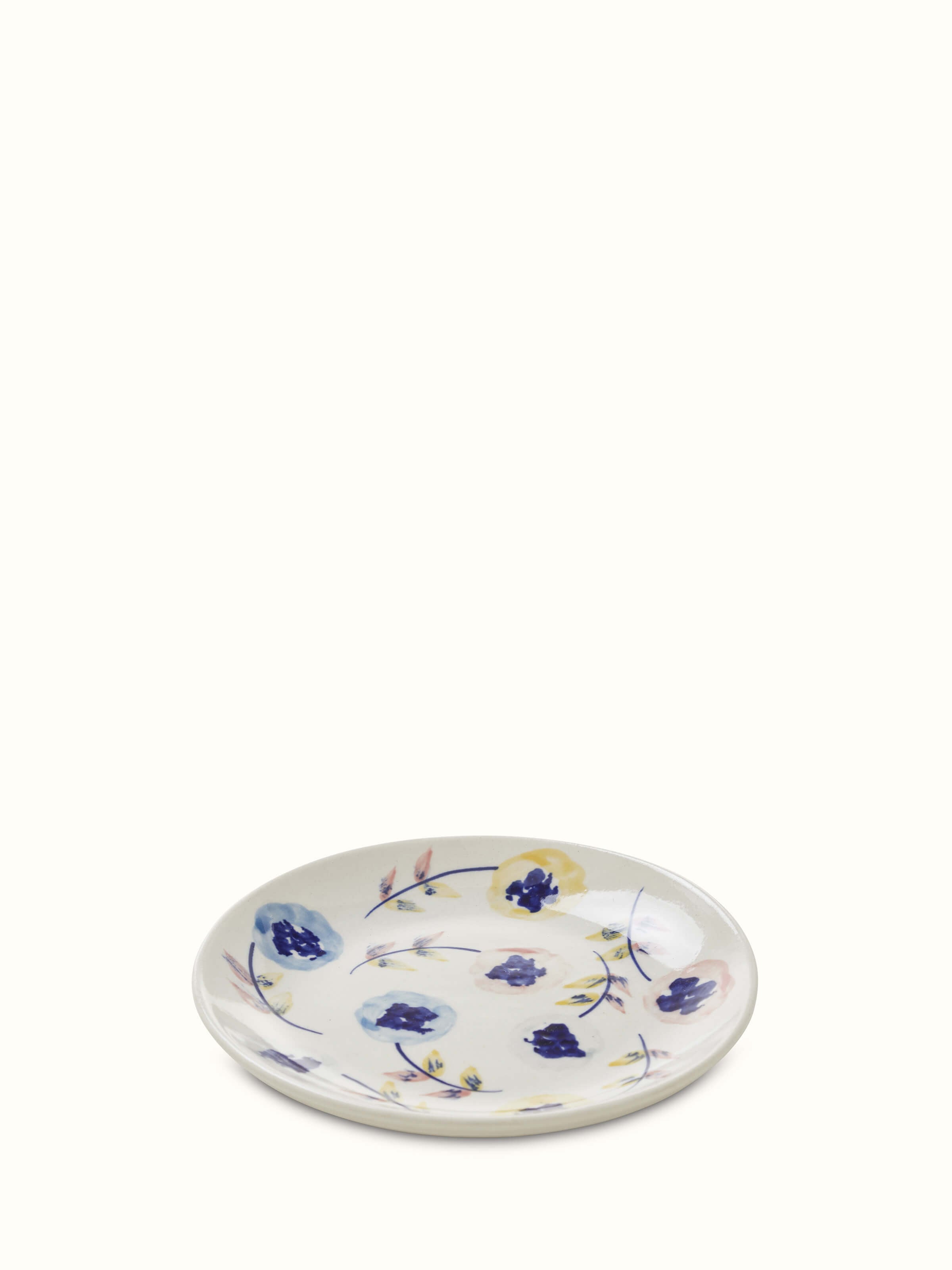 Top view of Khurja pottery ceramic salad plates in white and blue (4 pcs) showcasing the vibrant blue designs on classic white plates