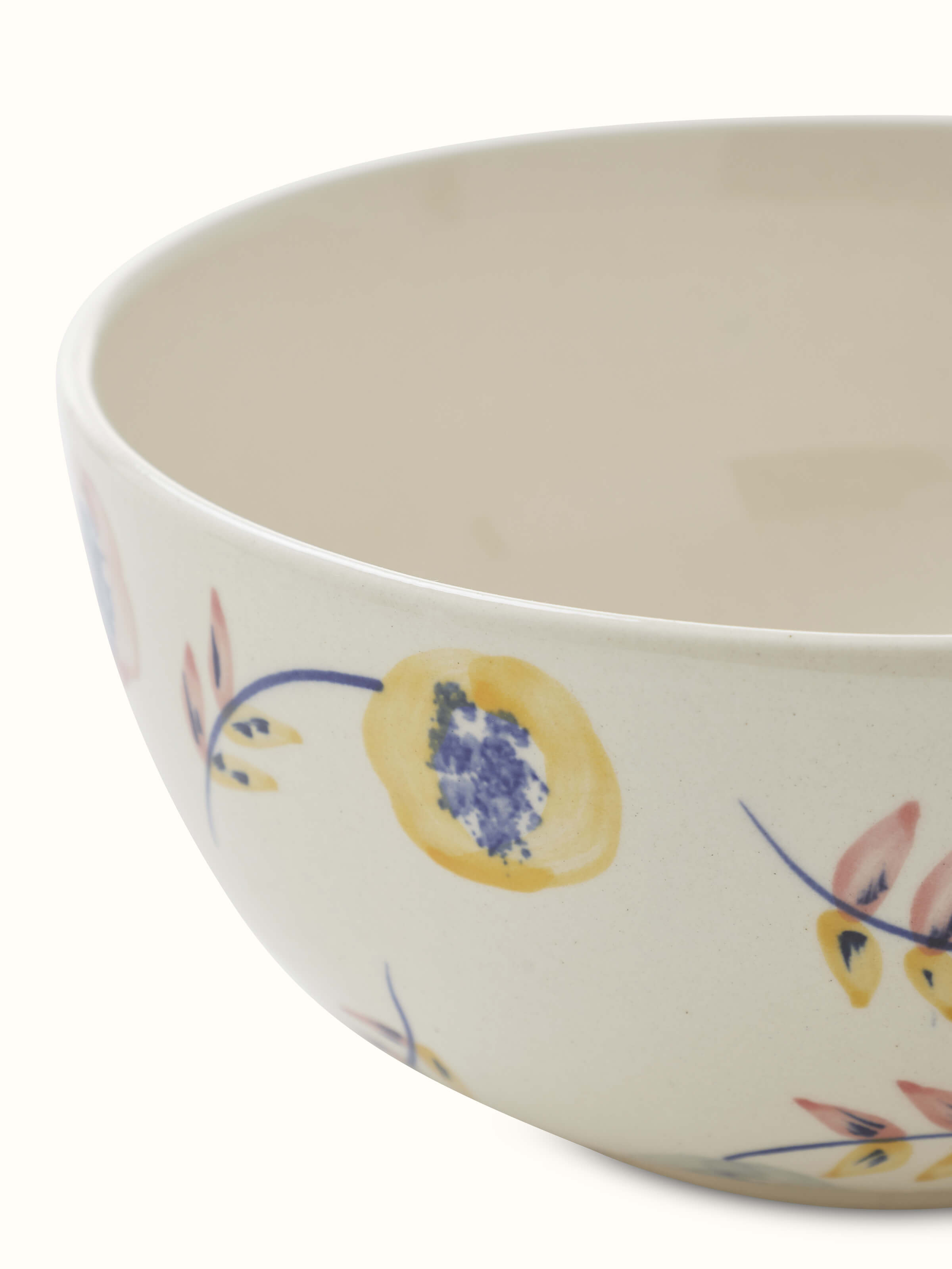 Close-up view of Khurja pottery ceramic serving bowl in white & blue highlighting the detailed patterns and ceramic texture