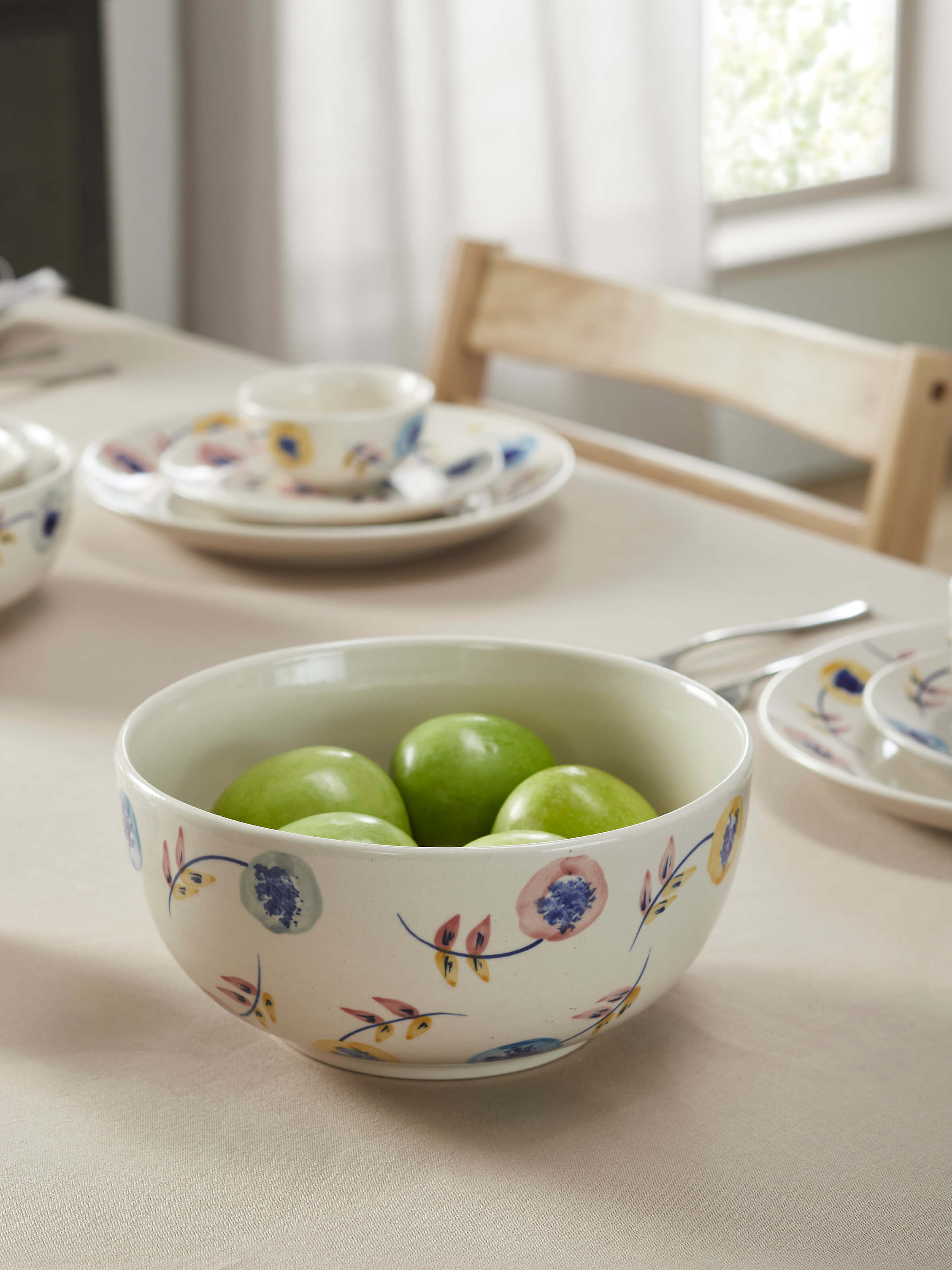 Close-up of Khurja pottery ceramic serving bowl highlighting detailed white & indigo glaze