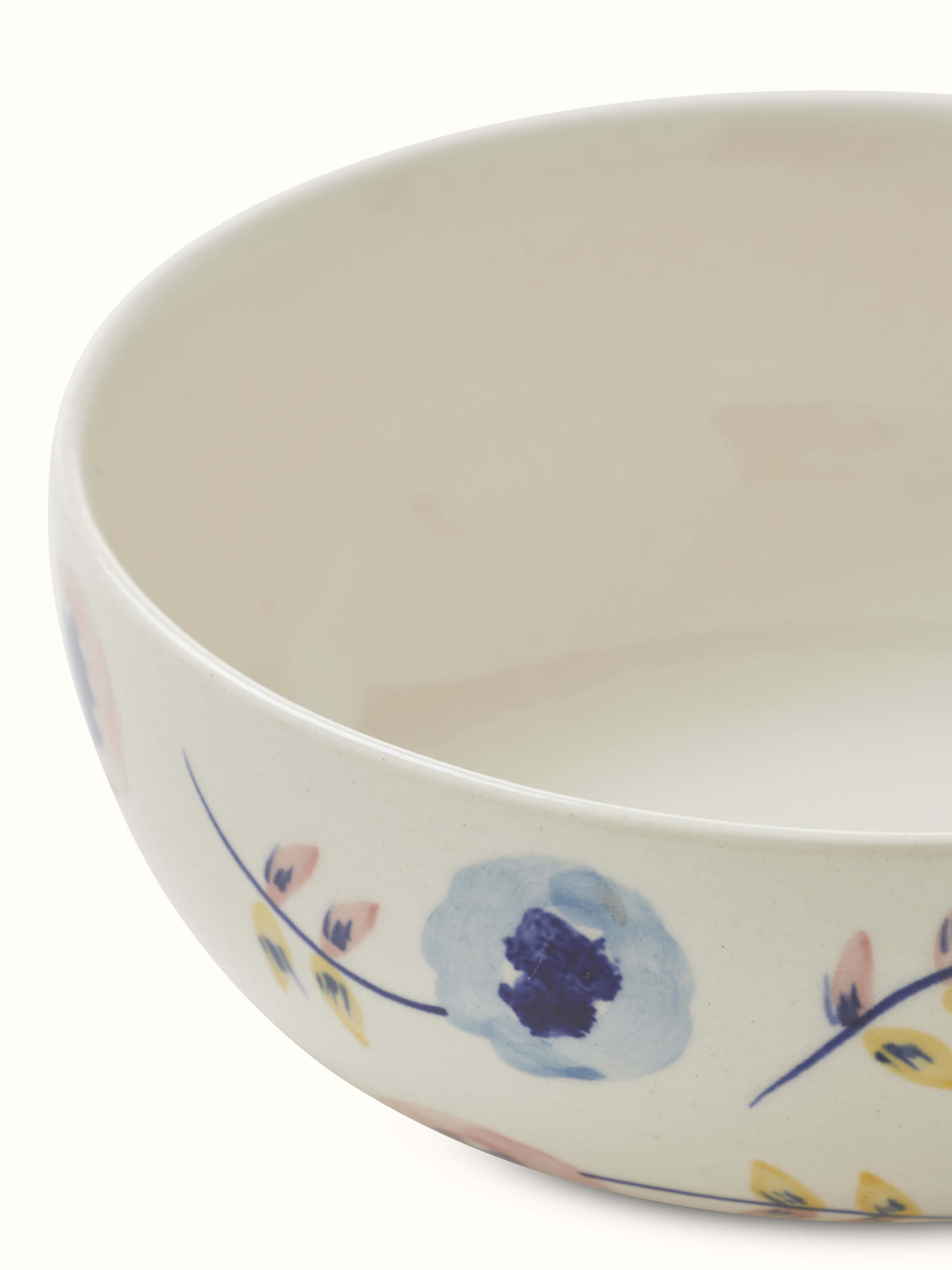 Detailed top view of Khurja pottery ceramic serving bowl in white & indigo with hand-painted accents