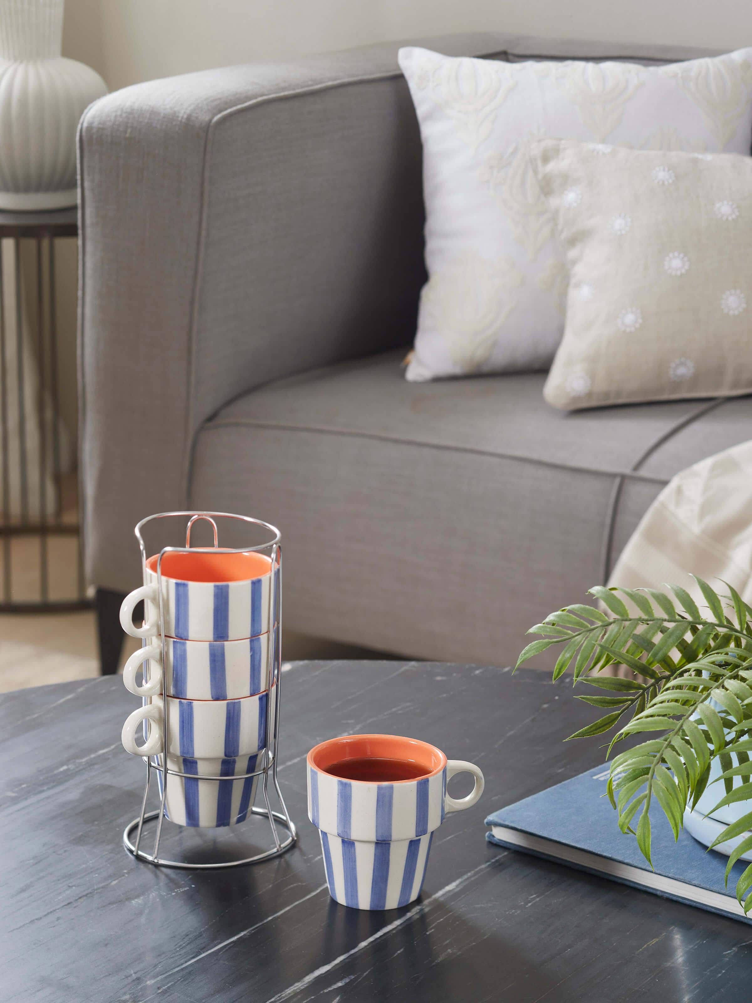 Side view of Khurja pottery ceramic coffee mugs in blue & white (4 pcs) highlighting the detailed patterns and ceramic finish.