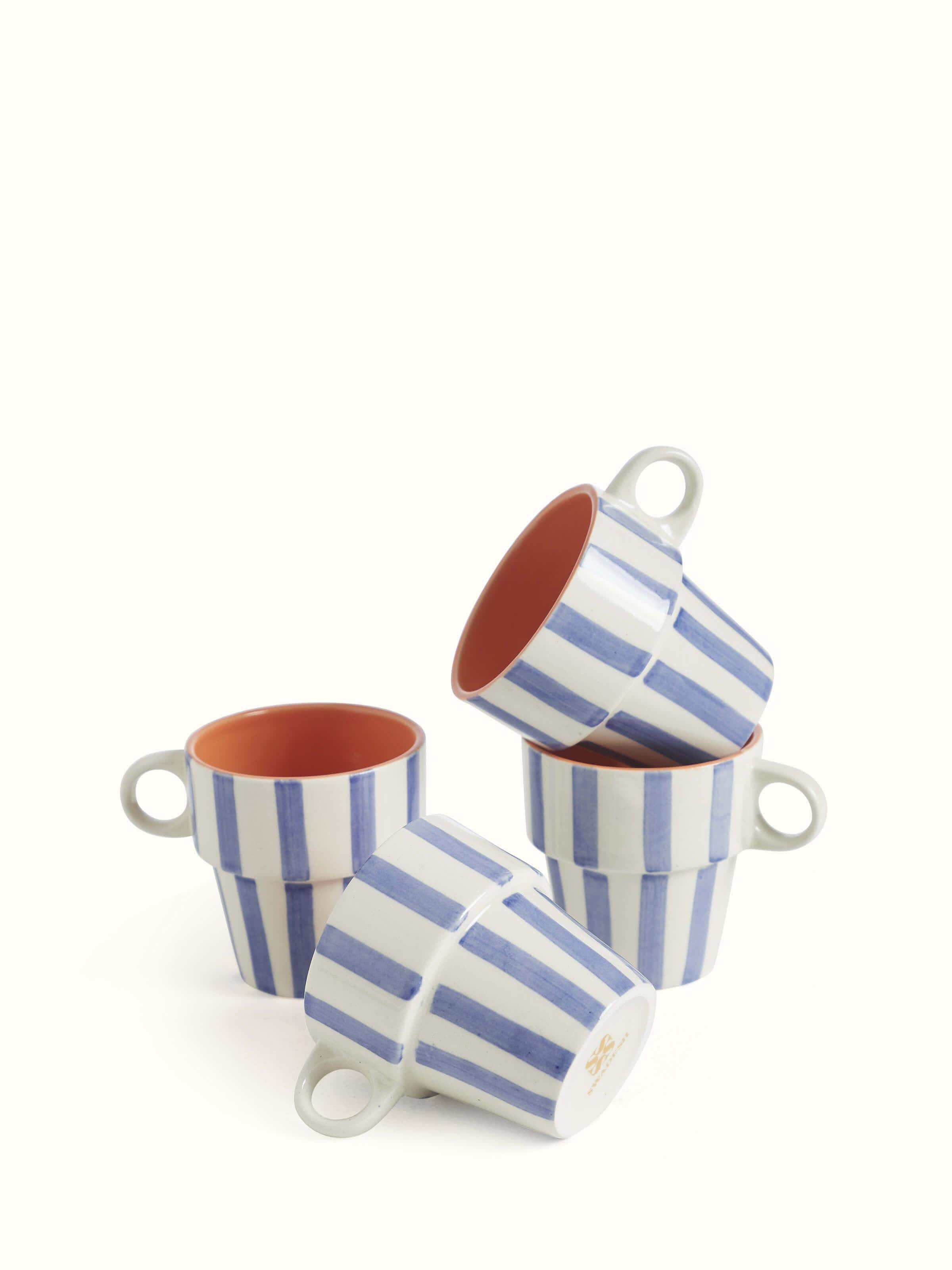 Side view of Khurja pottery ceramic coffee mugs in blue & white (4 pcs) highlighting the elegant shape and ceramic finish.