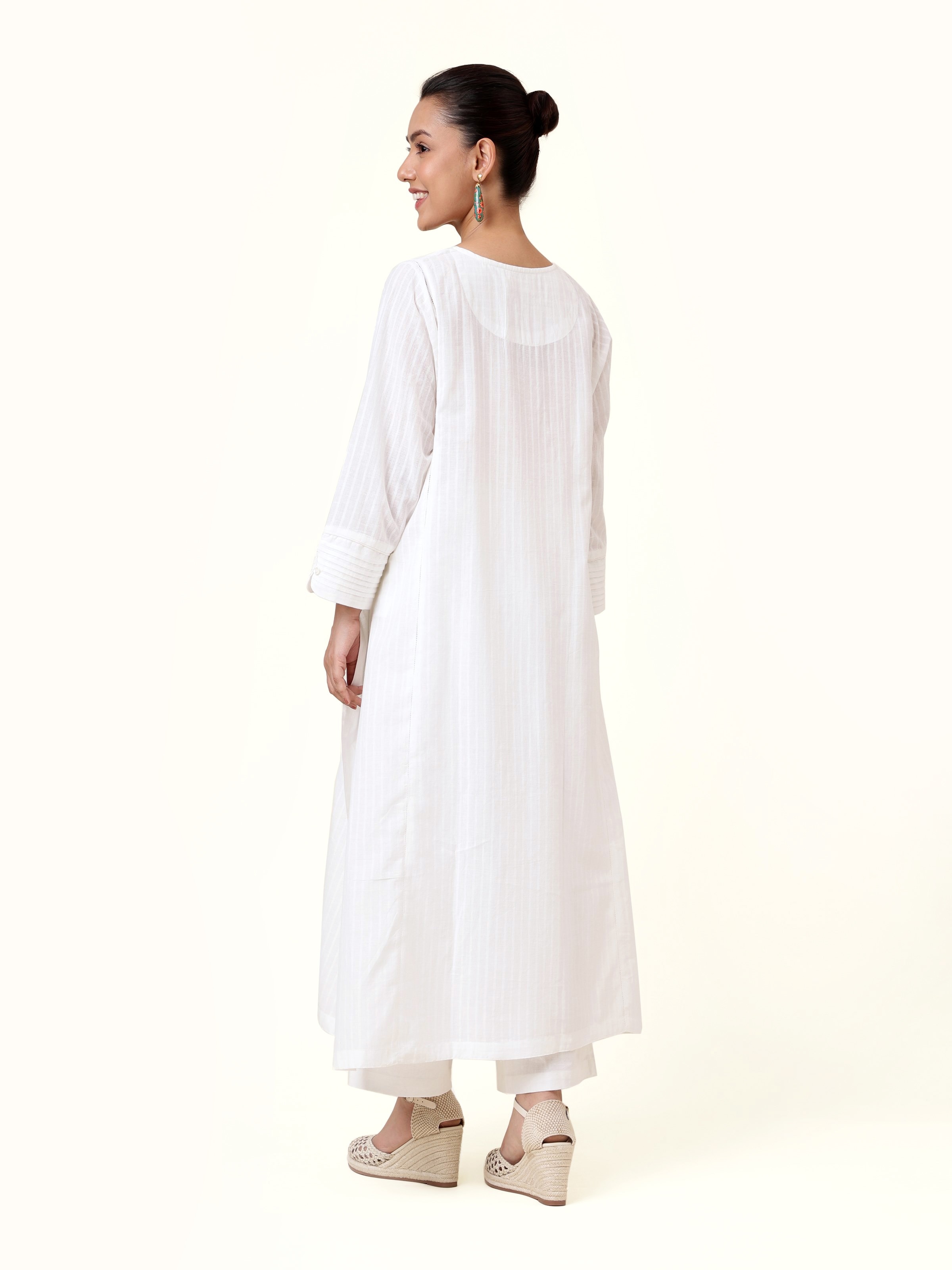 Back view of White Cotton Hand-spun Long Kurta with Pleated Cuff showing full length and pleated cuff