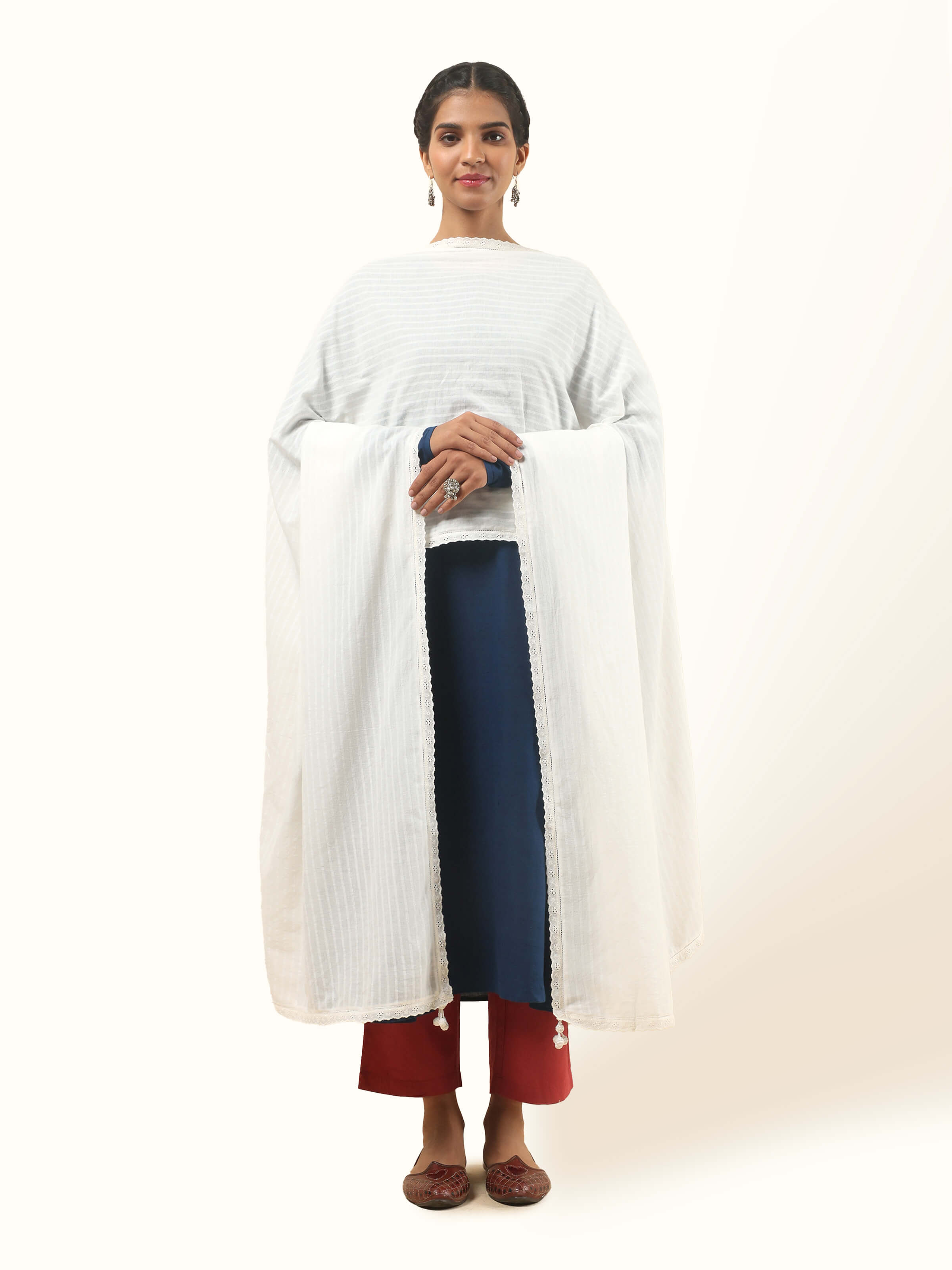 White cotton hand-spun dupatta displayed flat with soft texture and fine weave details.