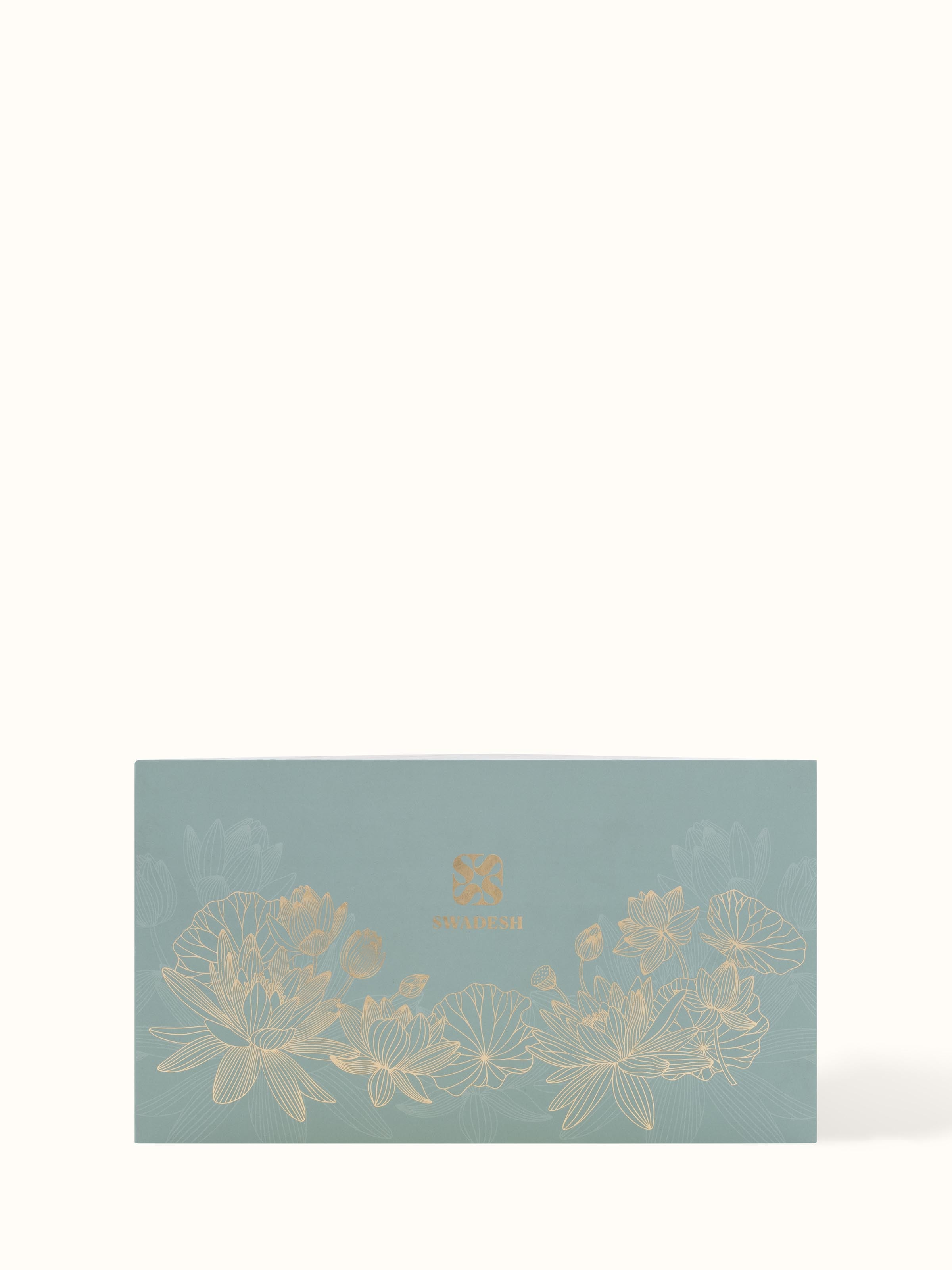 Back view of Mogra Glass Candle showcasing product details and care instructions