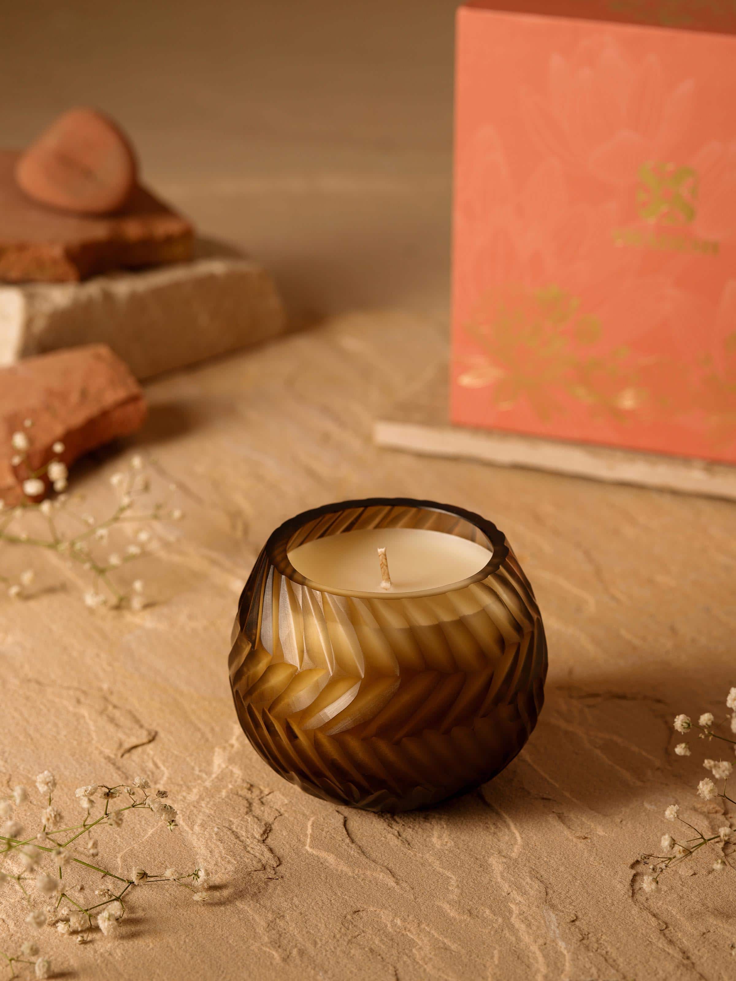 Close-up of Lotus Glass Candle highlighting the wax and wick details, enhancing its aesthetic appeal