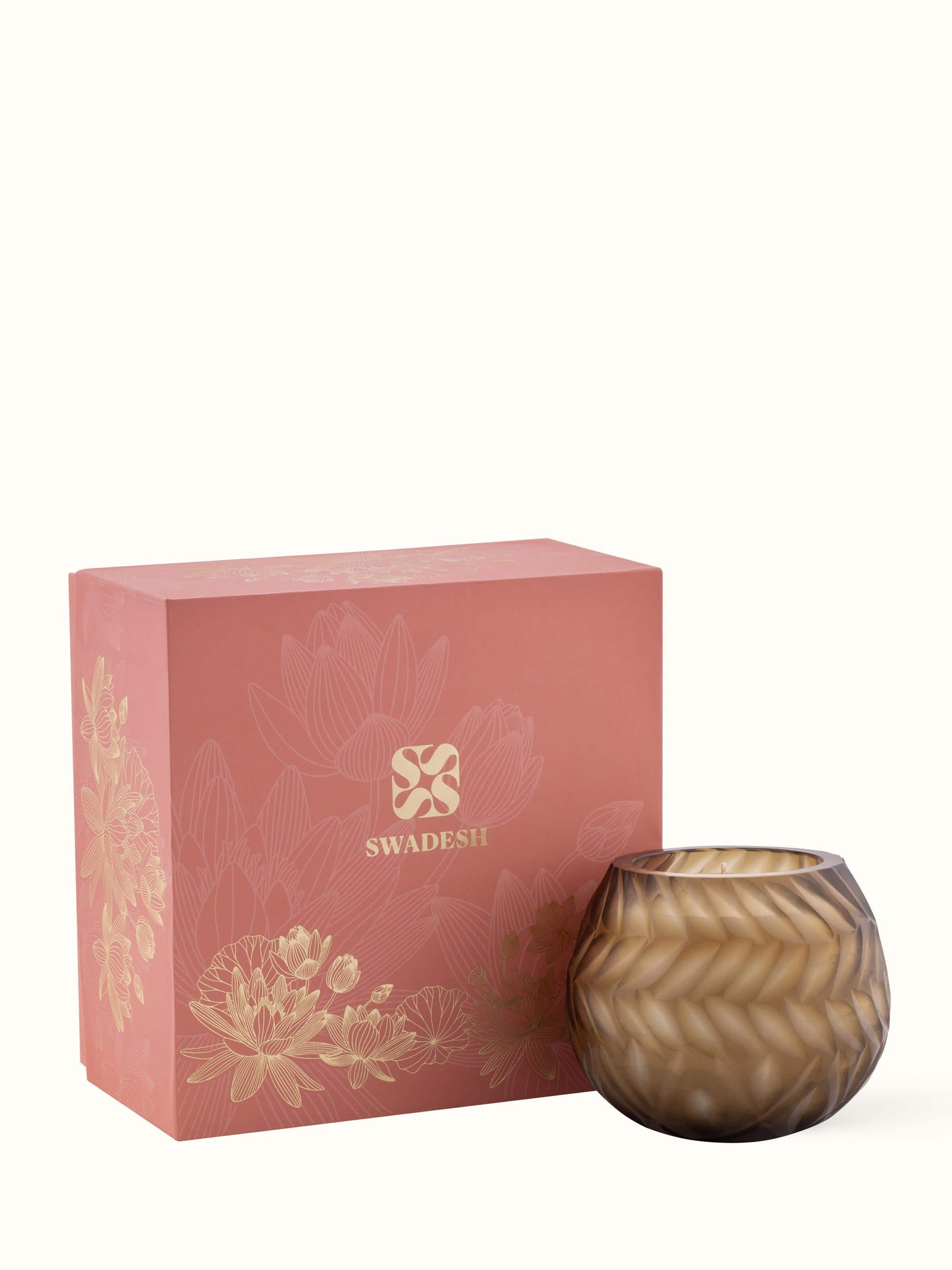 Back view of Lotus Glass Candle showcasing the label and product information
