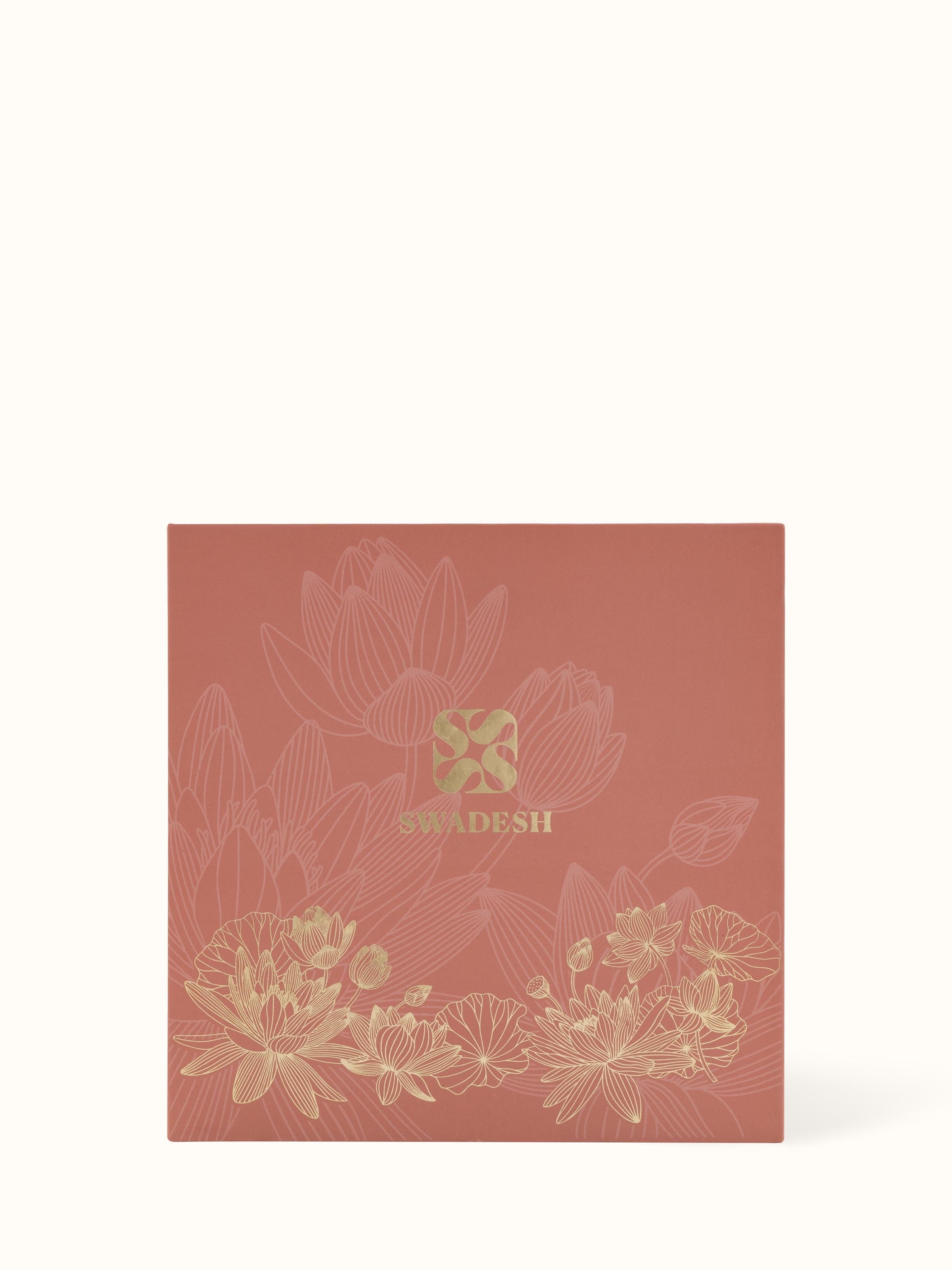 Angled view of Jasmine Glass Candle showcasing the overall shape and wax inside the glass jar