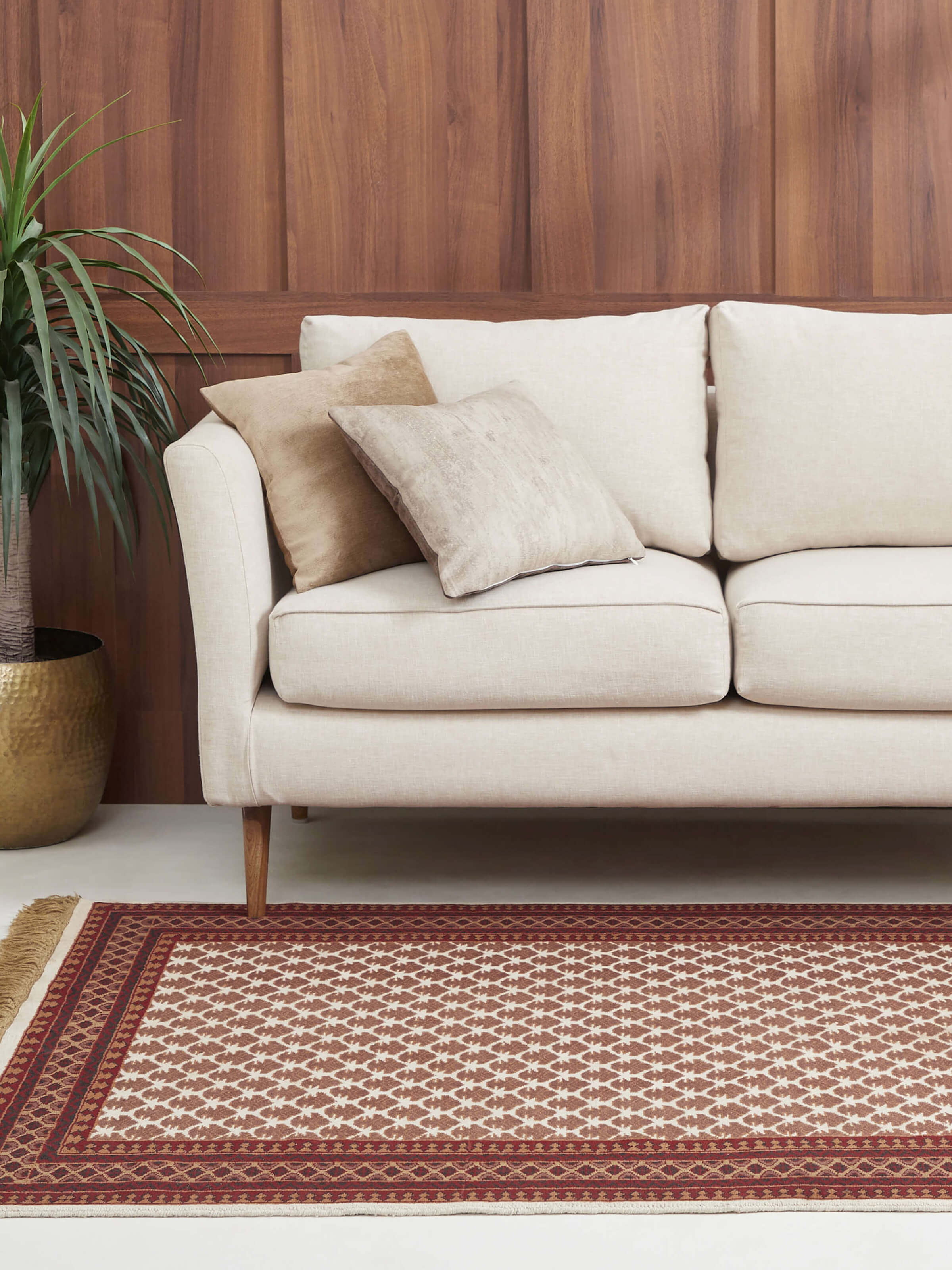 Traditional hand-knotted Gwalior wool rug in lichi ivory and rust tones with vintage floral pattern