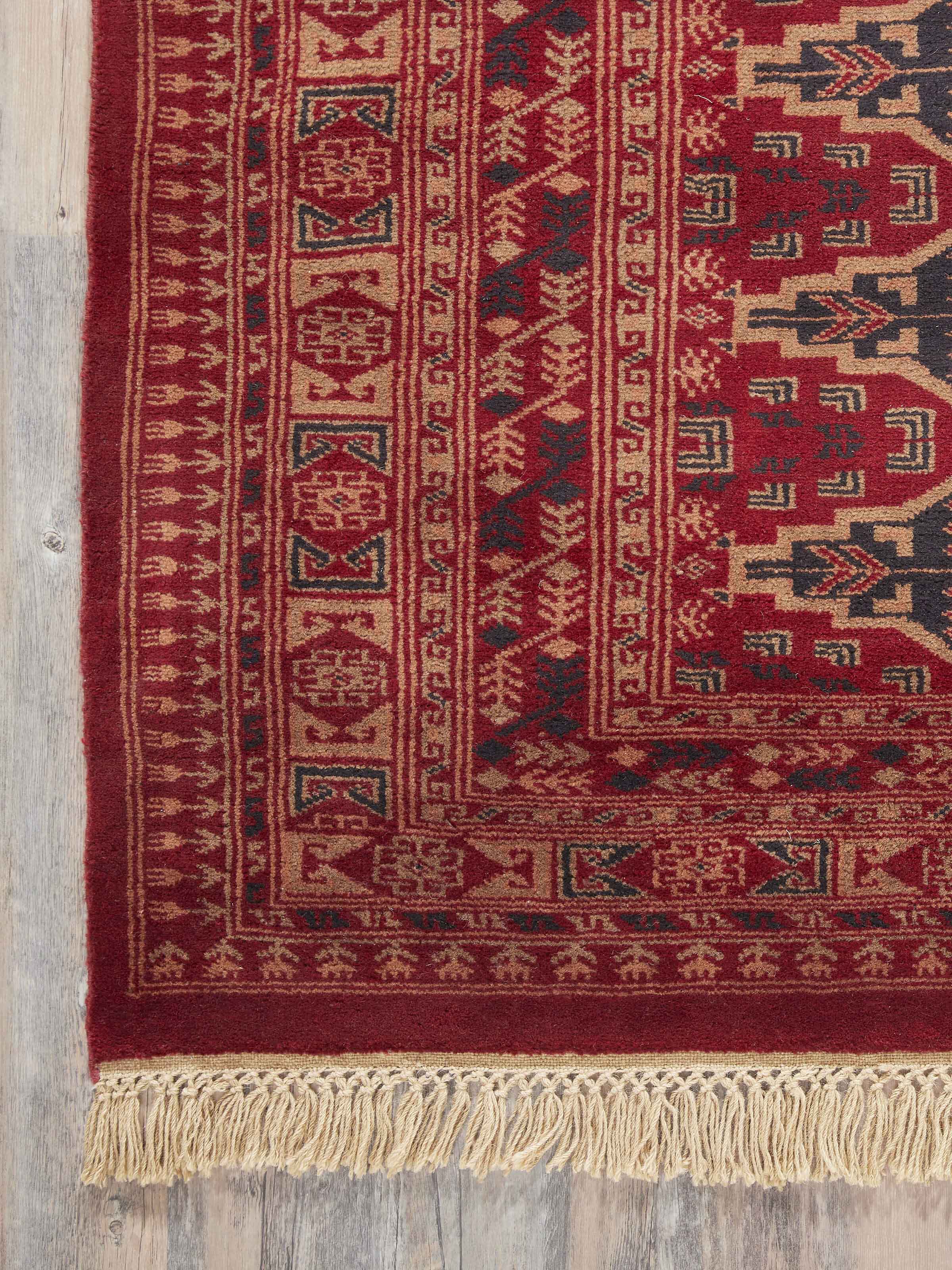 Detailed shot of Traditional Persian Shiraz red Gwalior wool hand-knotted rug (6x9 ft) showing fine texture and colors