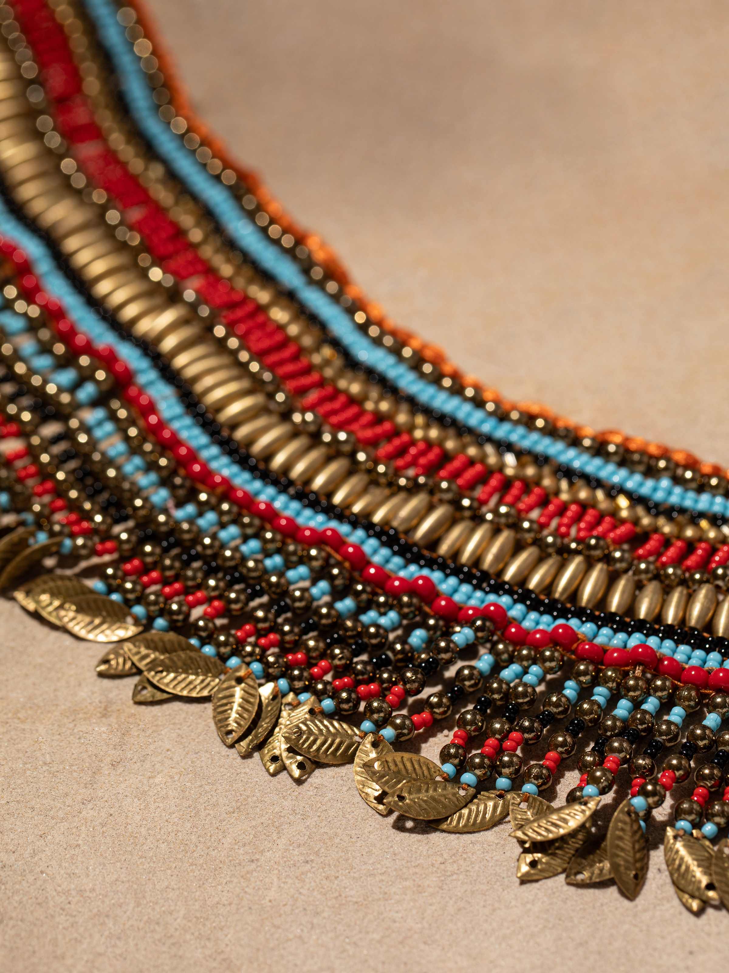 Detailed view of Handcrafted Collar Necklace showing intricate patterns and luxurious finish
