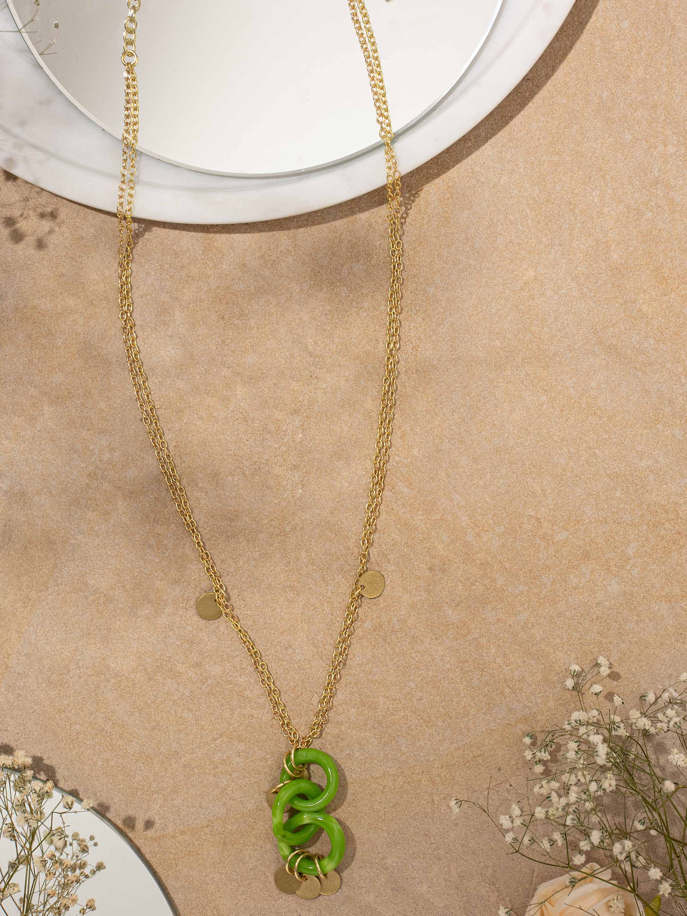 Close-up view of Glass Bead Pendant & Chain emphasizing the fine details and craftsmanship of the glass beads.