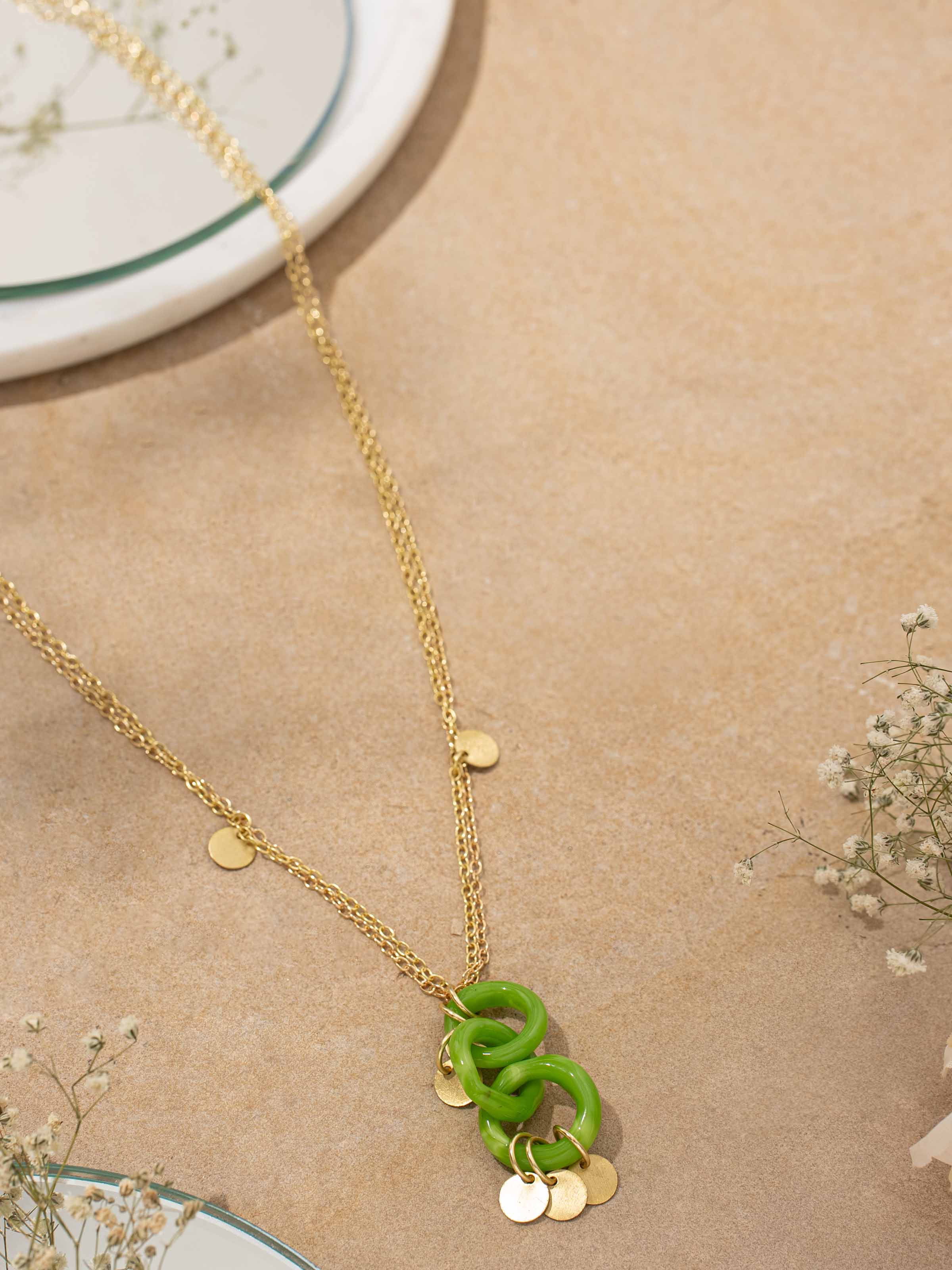 Detailed view of Glass Bead Pendant & Chain from a distance, highlighting its full design and bead details.