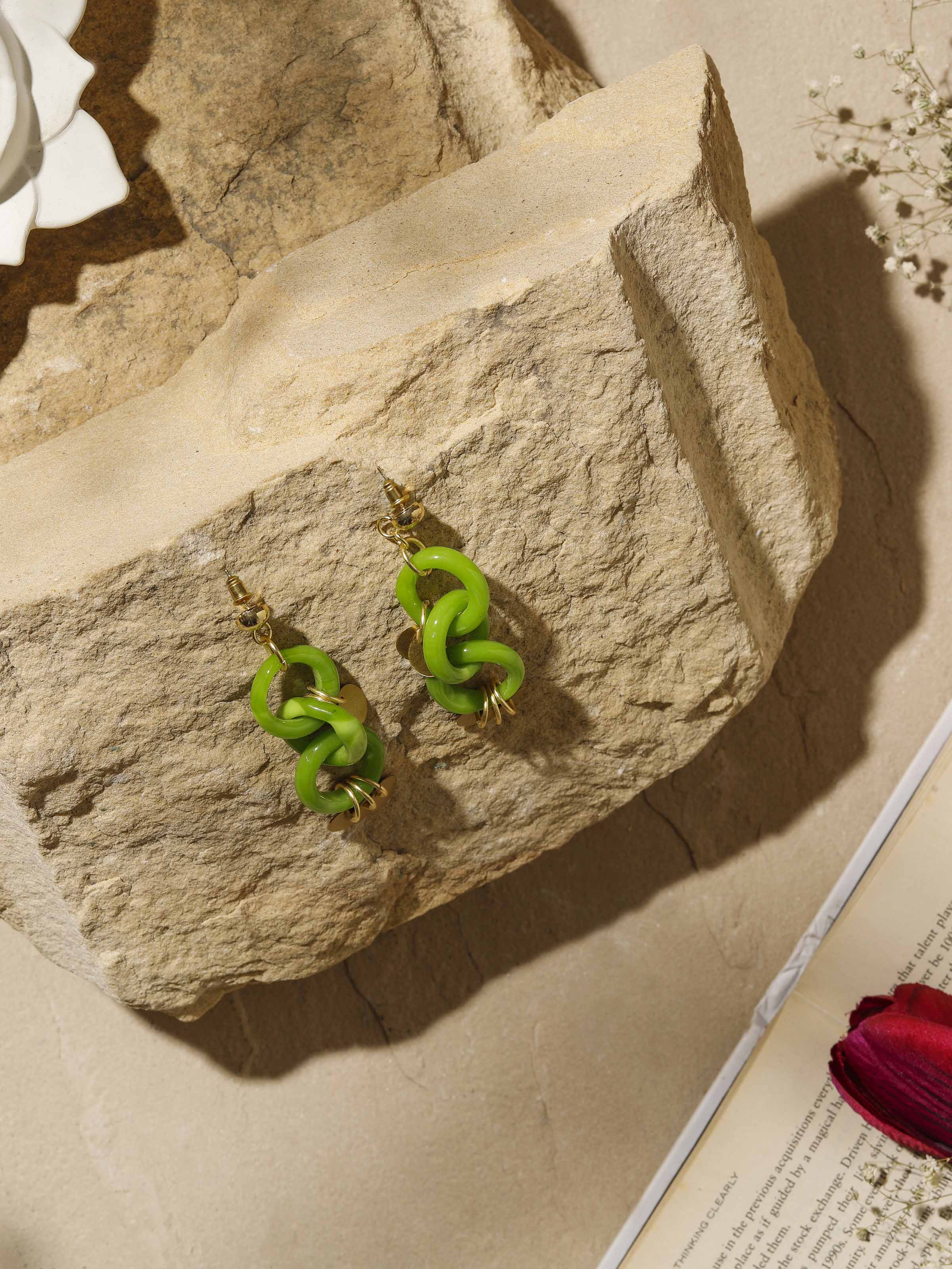 Side view of glass bead drop earrings showcasing the intricate beadwork and unique design.