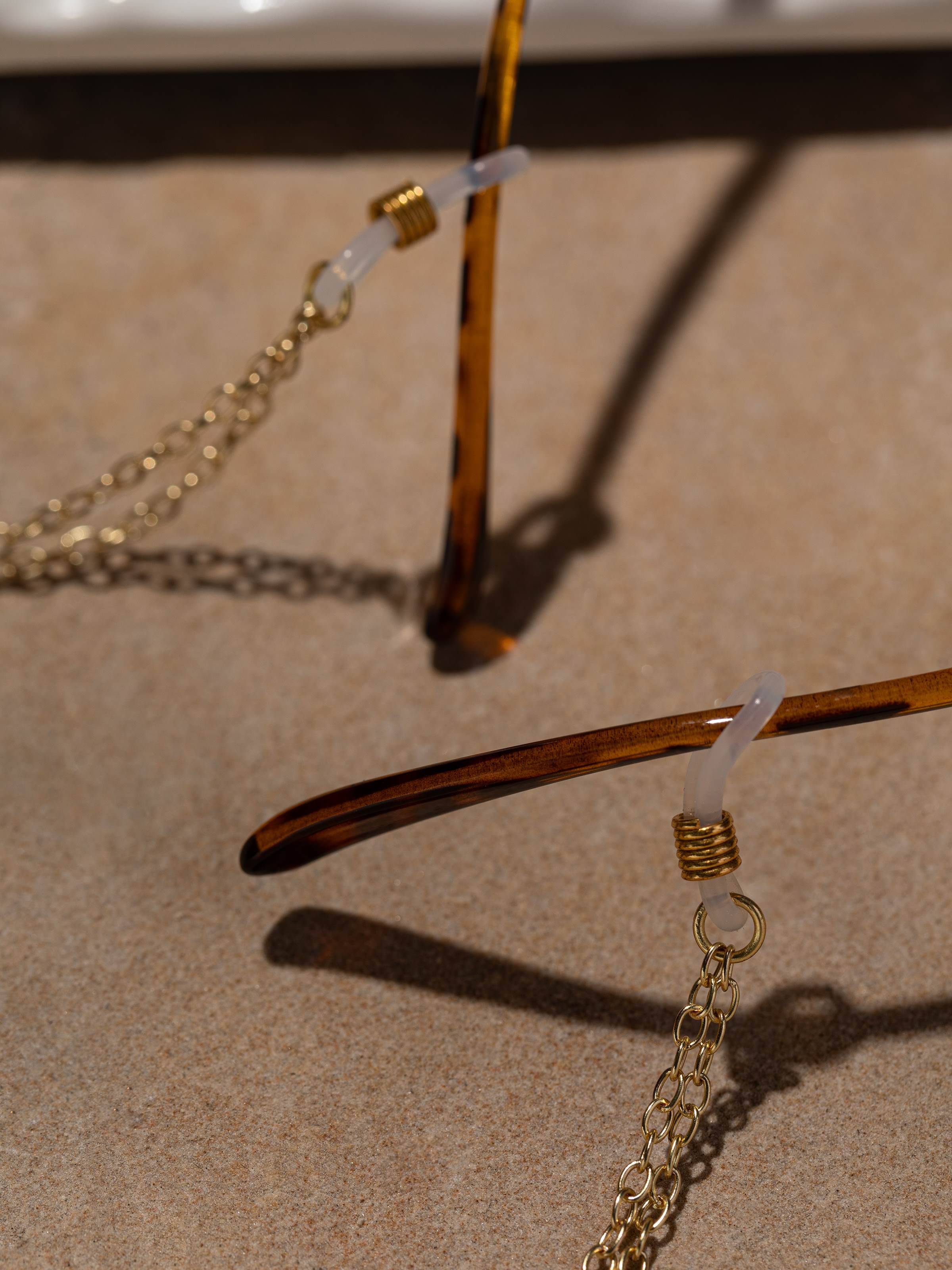 Back view of glass bead lanyard showcasing the secure clasp and overall design.